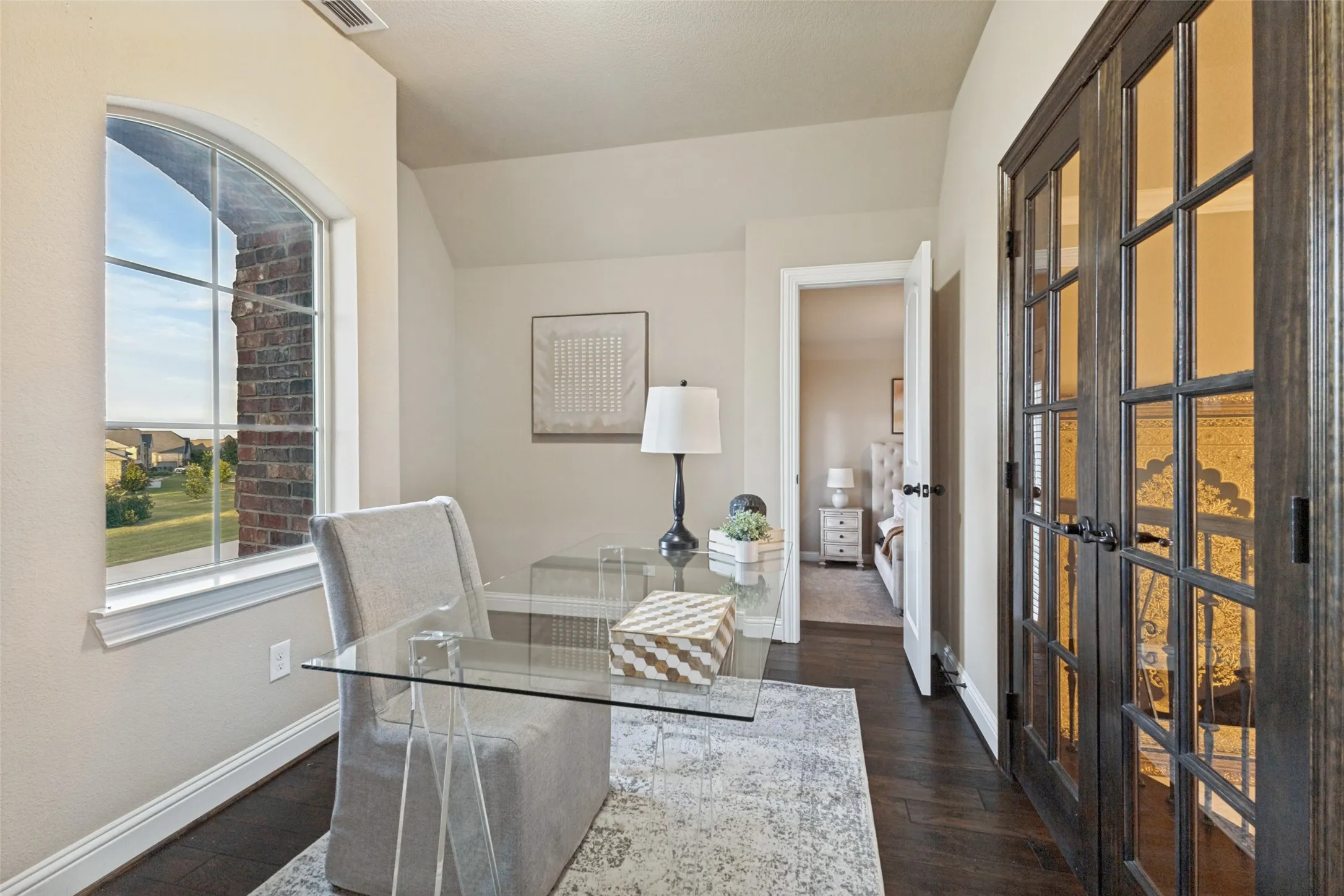 This room connects the second primary bedroom to another large secondary bedroom.