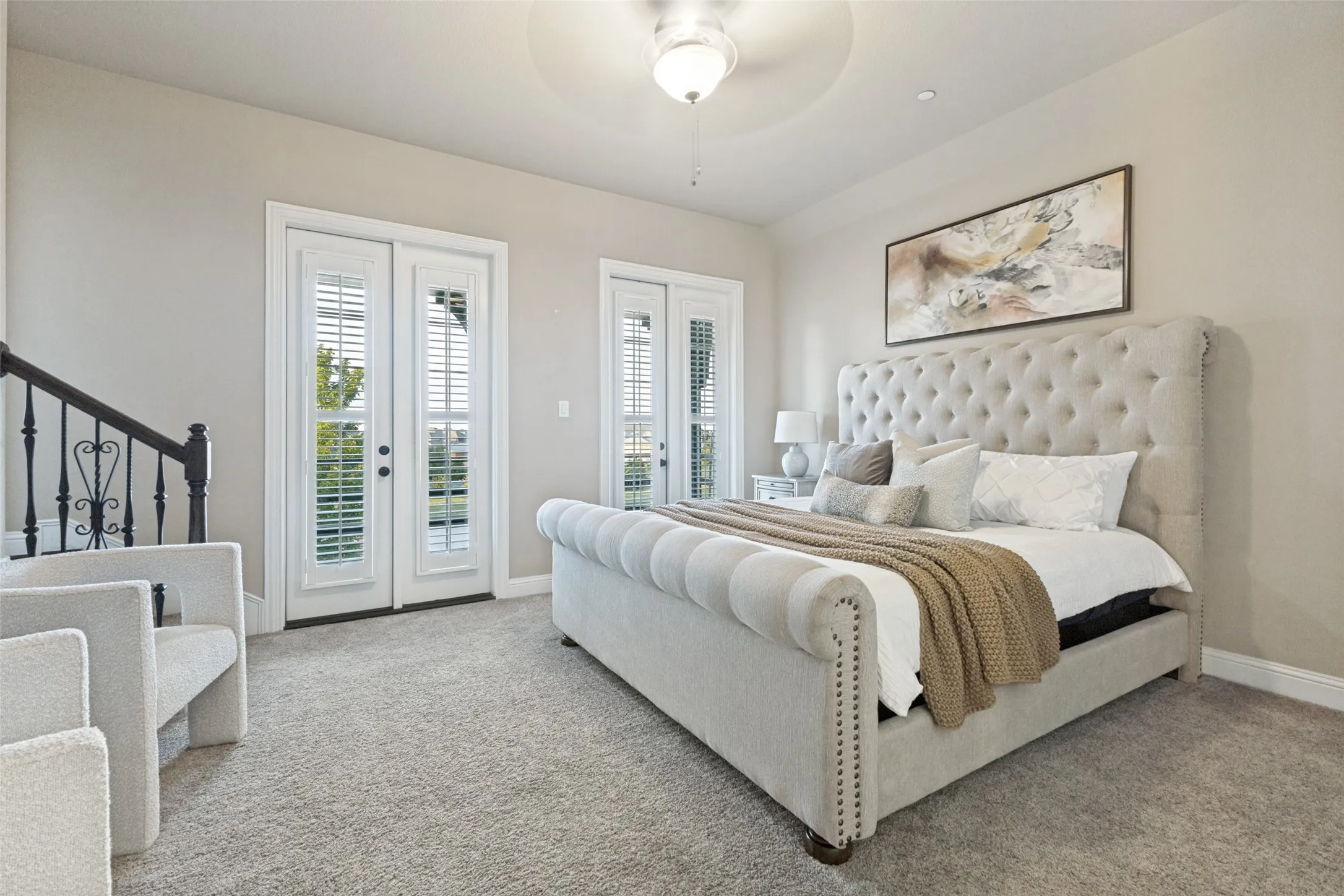 Large secondary bedroom at the front of the home with walk in closet.  Connected to the second master upstairs by way of the office.