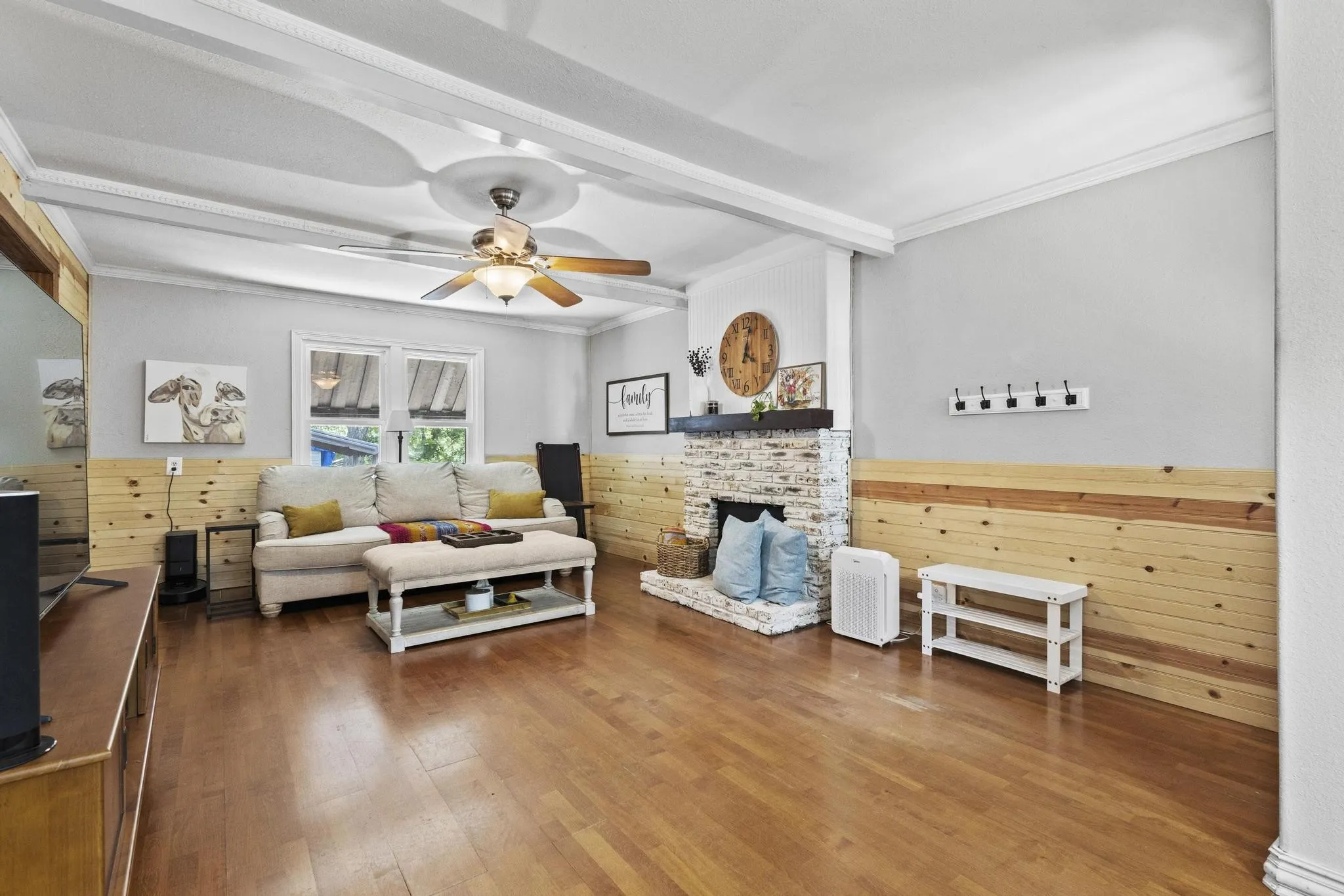 Large living room with natural light and easy access to dinning area and kitchen