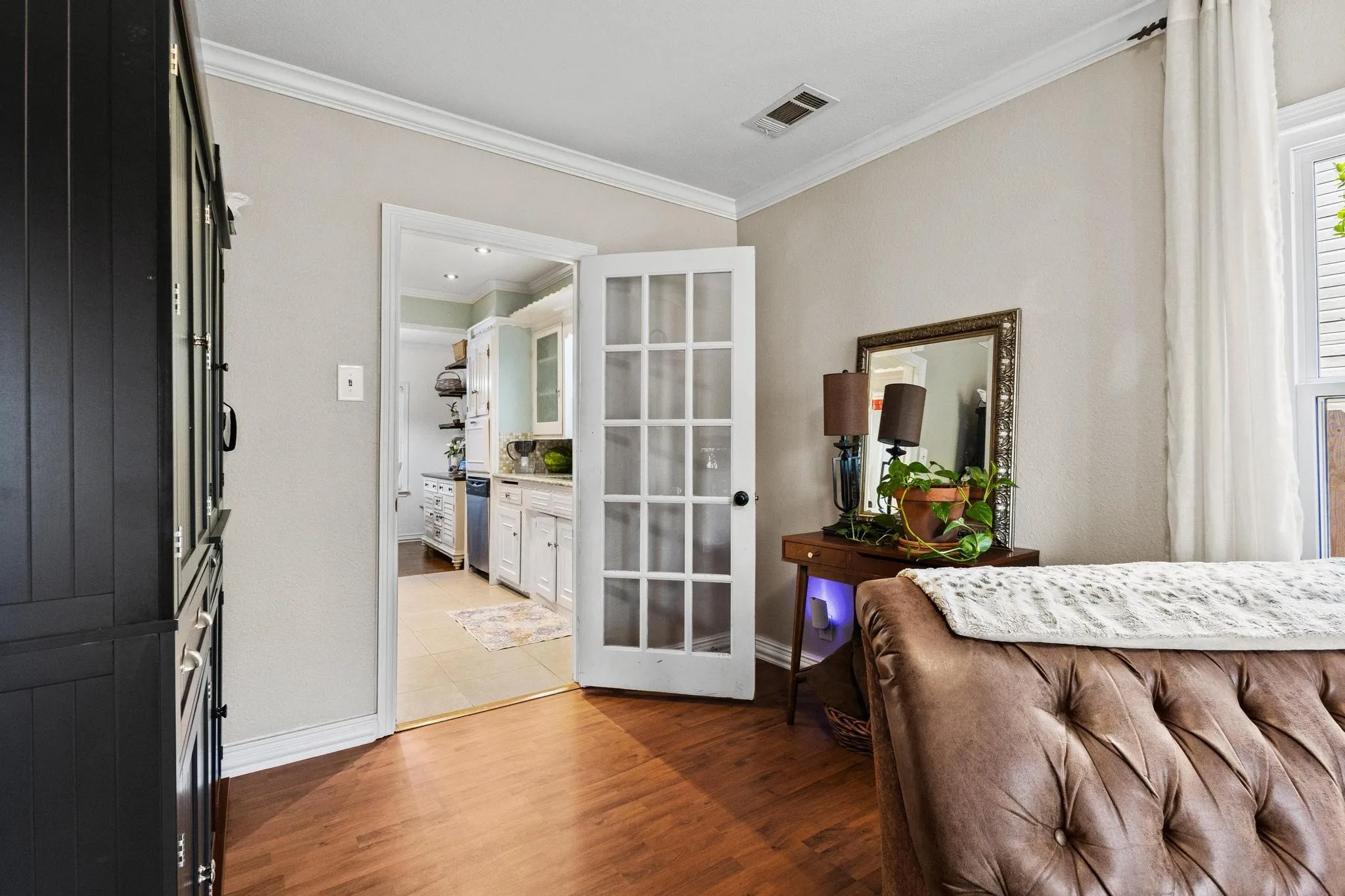 Access to kitchen from sitting area. Perfect to host or close the door and have some peace and quiet