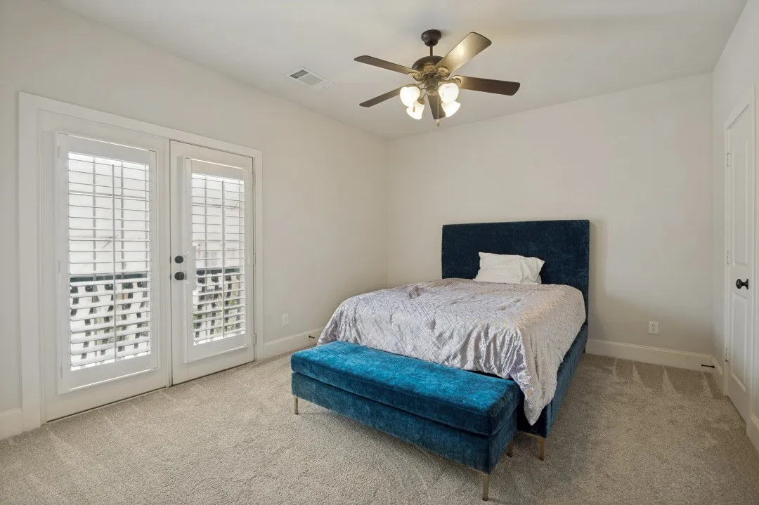 Dual French doors with interior plantation shutters