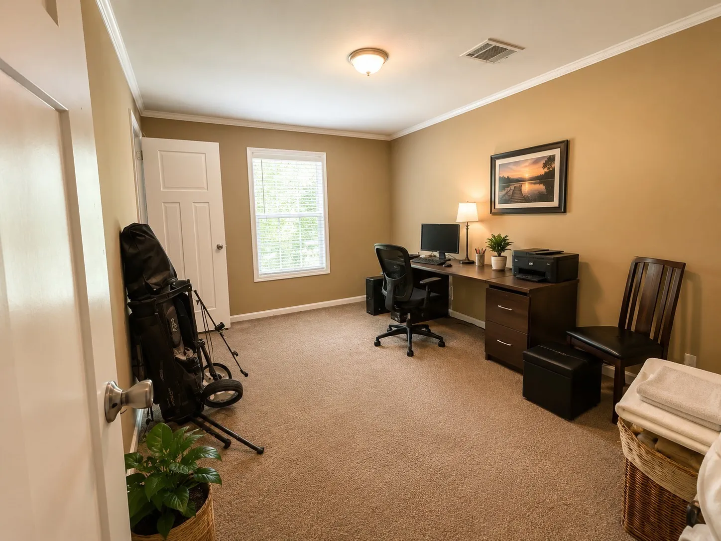 Carpeted room with a single window featuring horizontal blinds