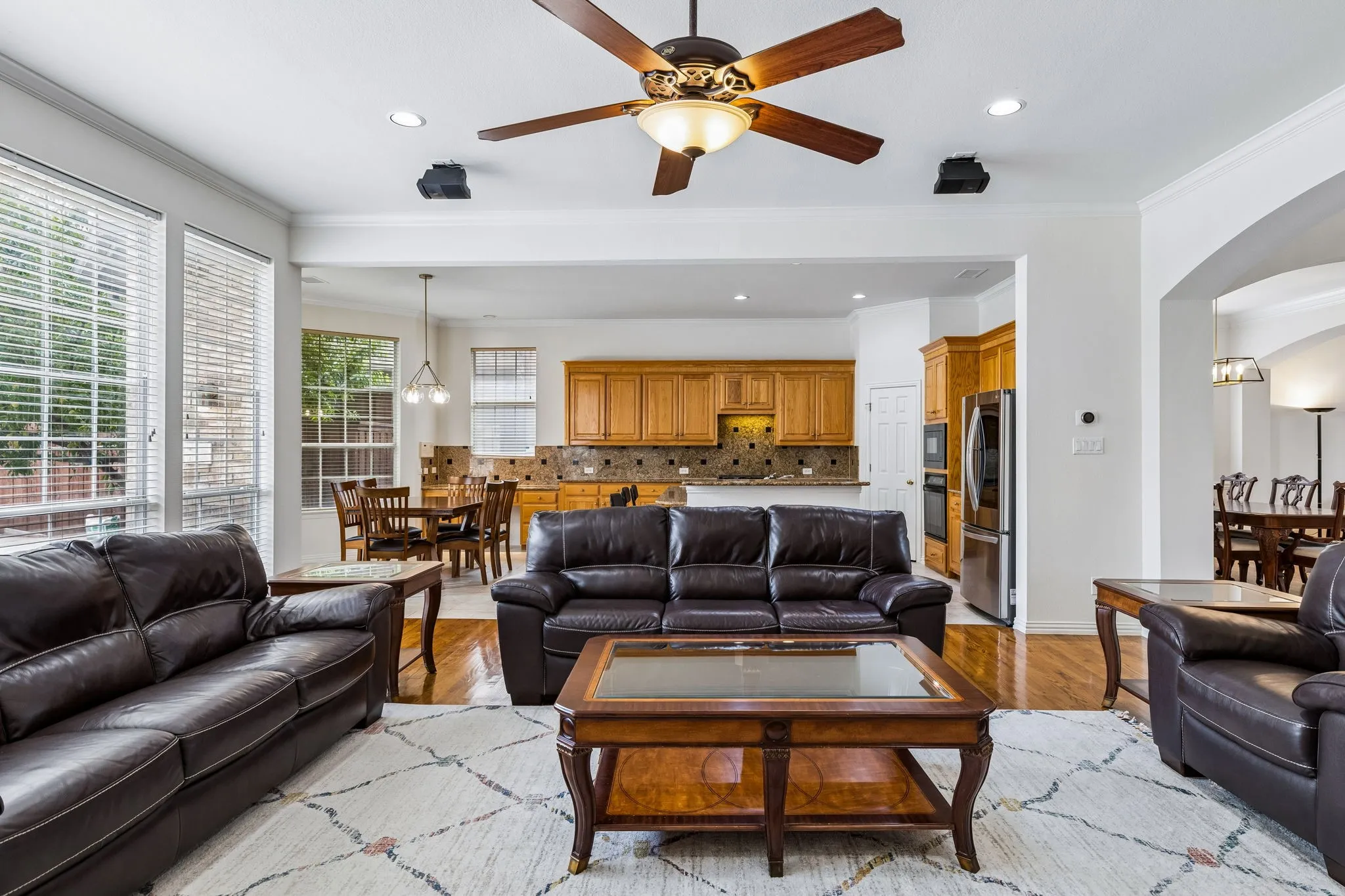 A picture's worth a thousand words! Living is easy in this impressive, generously spacious home. Natural light with floor to ceiling windows and an open concept unifying your living area and kitchen.