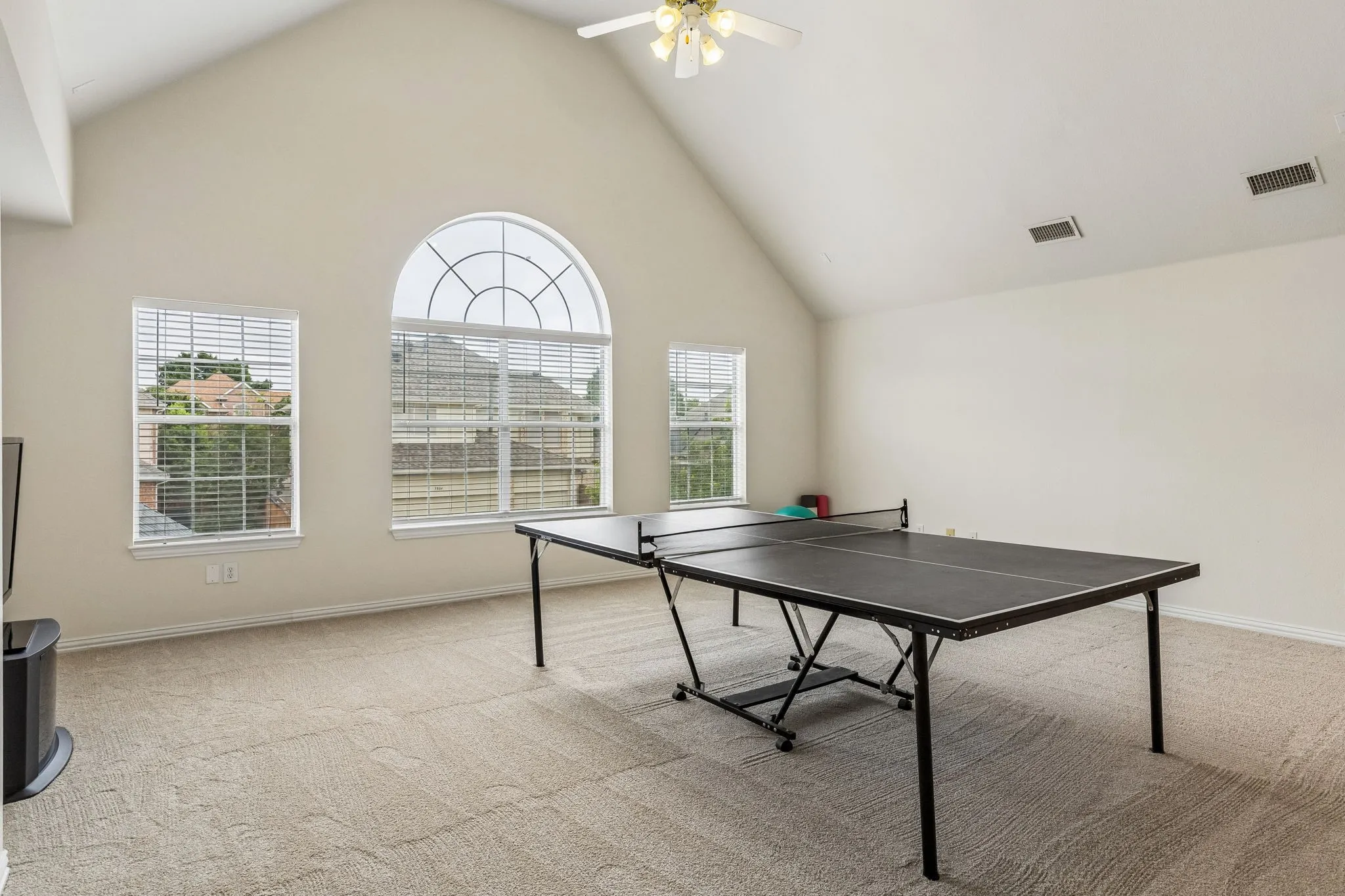  A true standout feature of the home, this expansive game room offers exceptional space and unlimited versatility. Large enough to accommodate multiple activity zones, it can effortlessly serve as a media room, billiards room, fitness area, home office, teen retreat, or entertainment hub. Whether hosting game nights, movie marathons, or creating the ultimate flex space, this oversized room is limited only by your imagination. Let the games begin!!