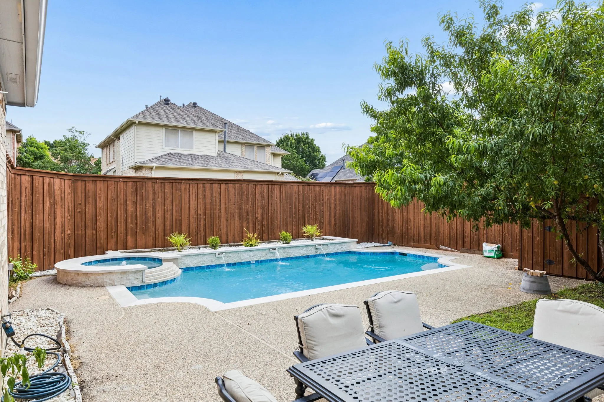 The sparkling pool creates the perfect setting for relaxing weekends, entertaining guests, and enjoying Texas summers in style.