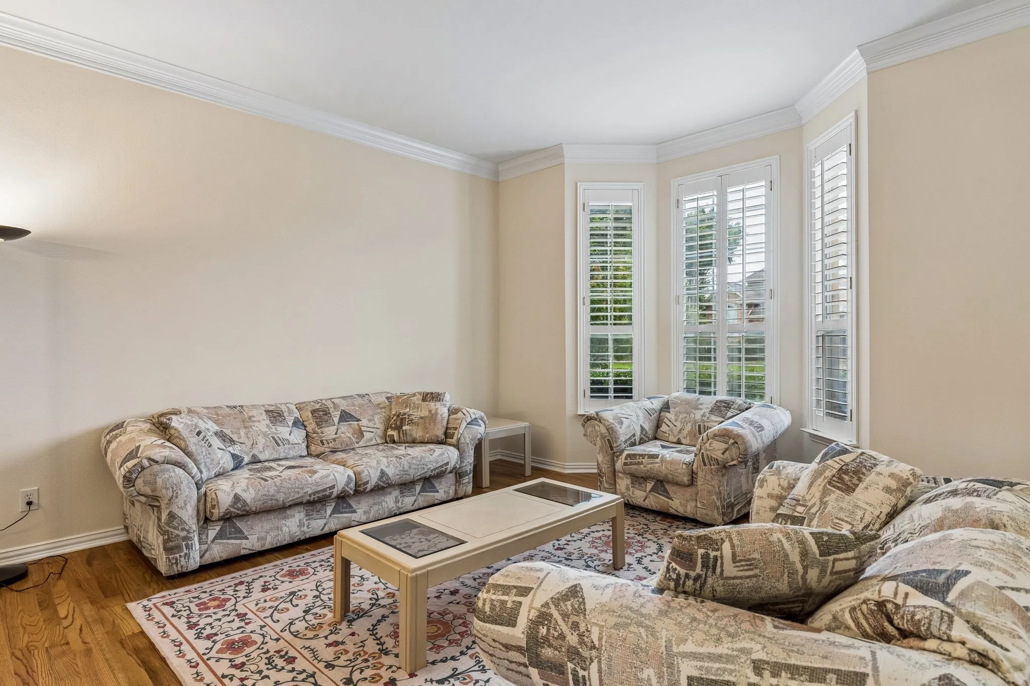 A large formal second living room to your right upon entering is perfect for entertaining or those quiet times when you'd like to read or scroll and be away from the busyness of others.