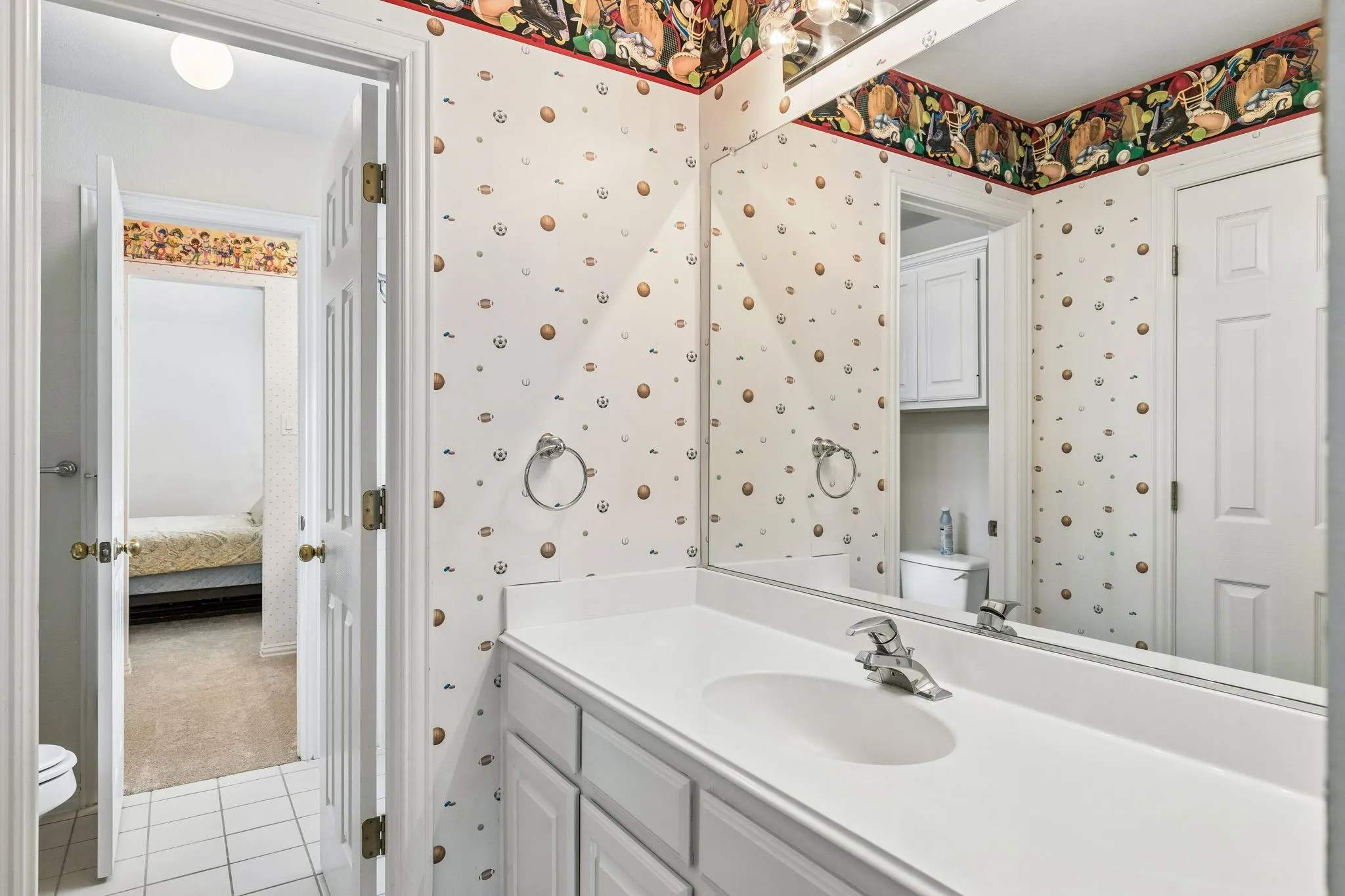 Featuring a tub and shower combination perfect for a relaxing soak or a quick rinse, plus a vanity with ample cabinet storage to keep all your essentials neatly tucked away.