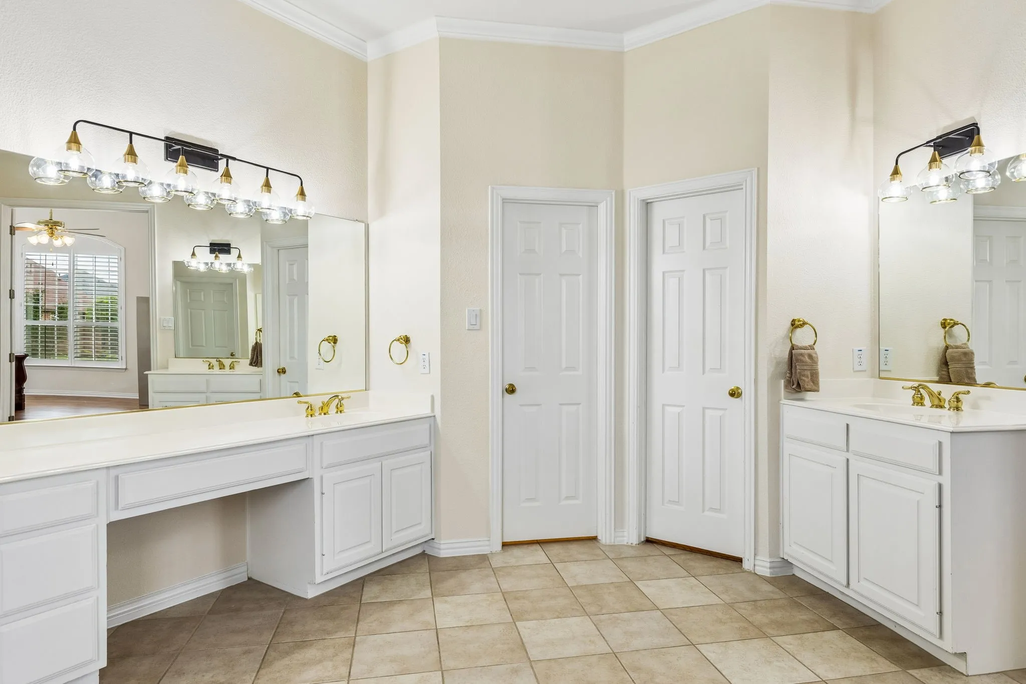Separate vanity areas provide plenty of personal space for busy mornings, while dual walk-in closets offer exceptional storage and organization. Unwind after a long day in the relaxing jetted Jacuzzi tub or enjoy the convenience of the separate walk-in shower. Combining comfort, space, and everyday practicality.
