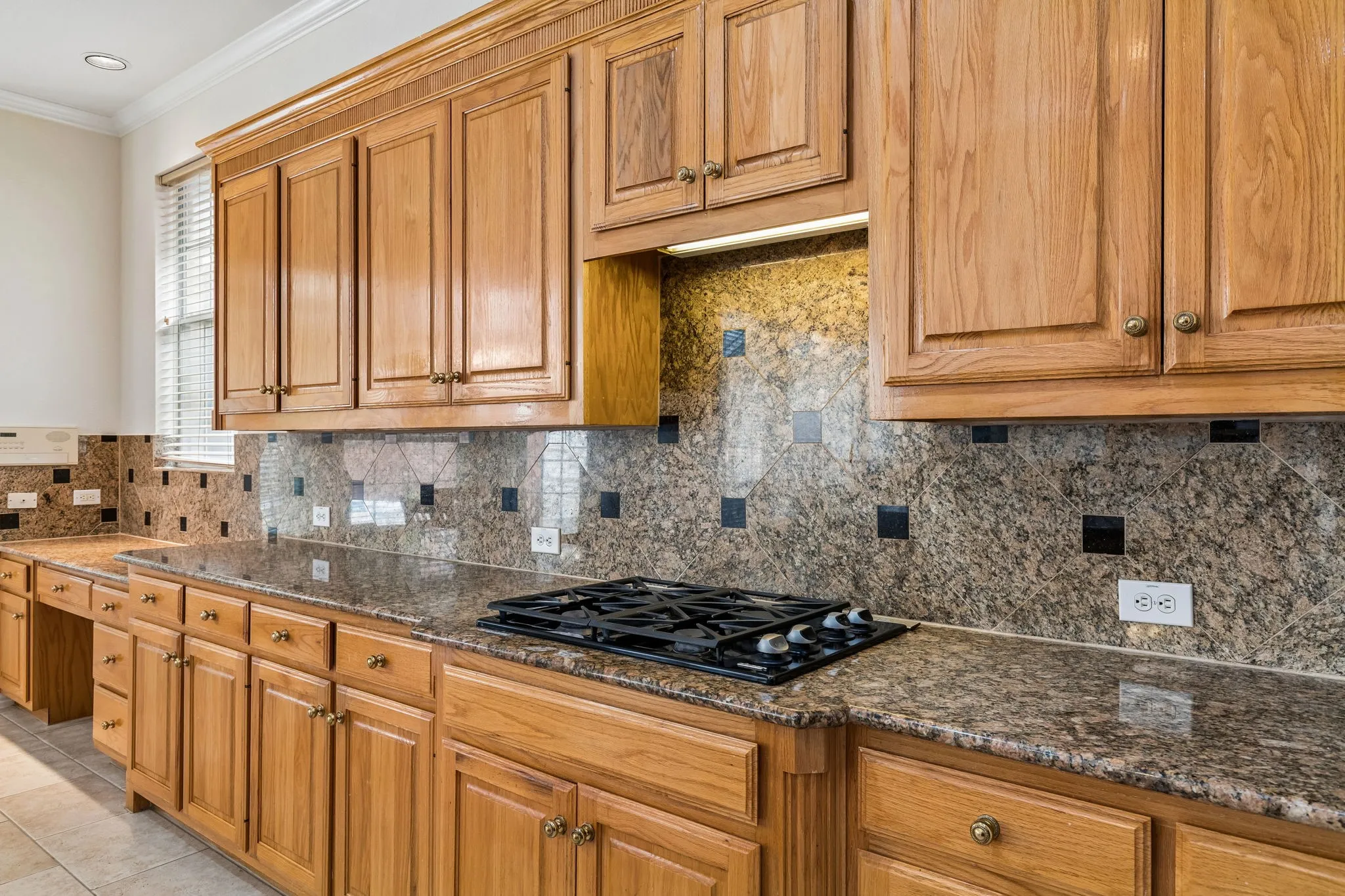 With generous countertops throughout, this home is a dream for the baking enthusiast in the family. Imagine the joy of rolling out an abundance of cookie dough with friends or the little ones in your life, creating cherished moments in this fun and inviting space.