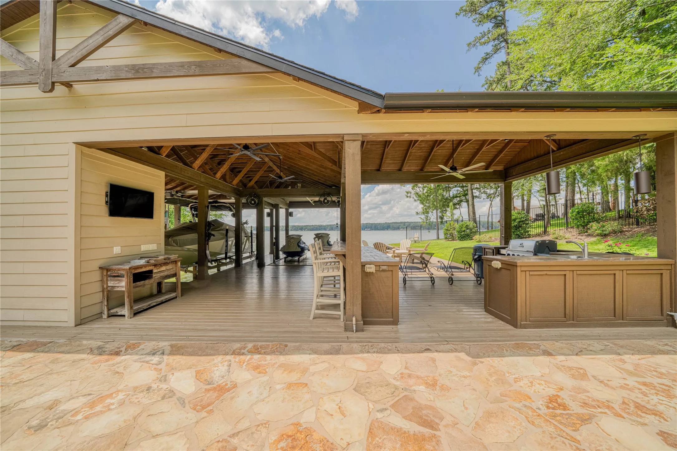 Boathouse With
Outdoor Kitchen, Dining and Living Areas