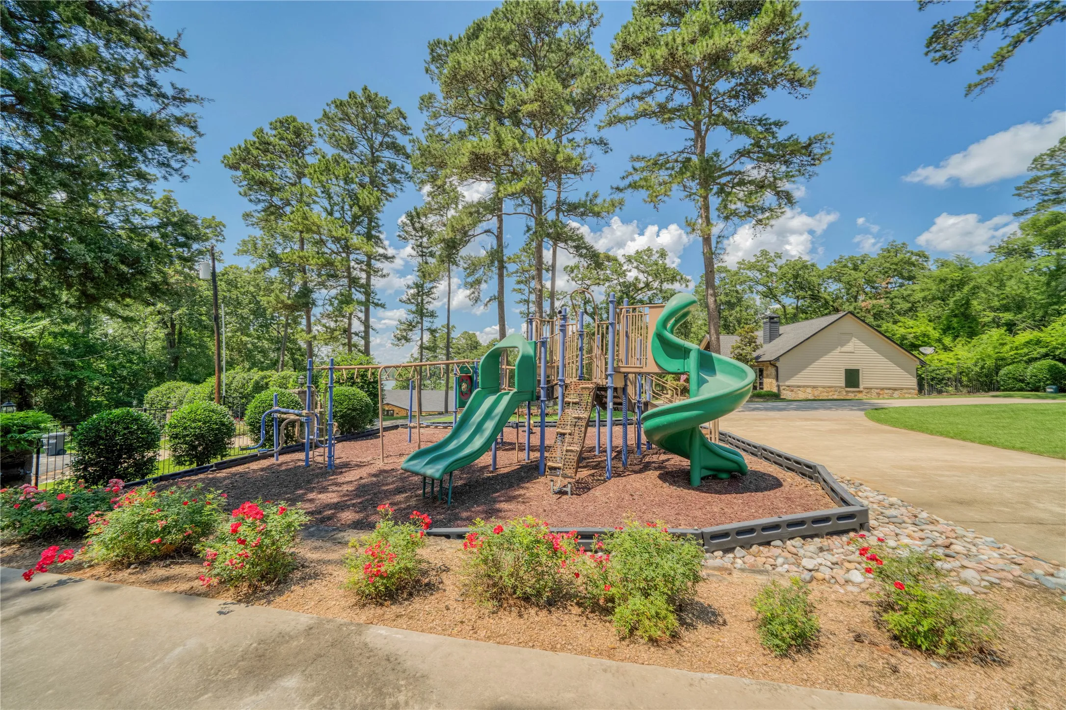 Playground With Fireplace and Patio Seating