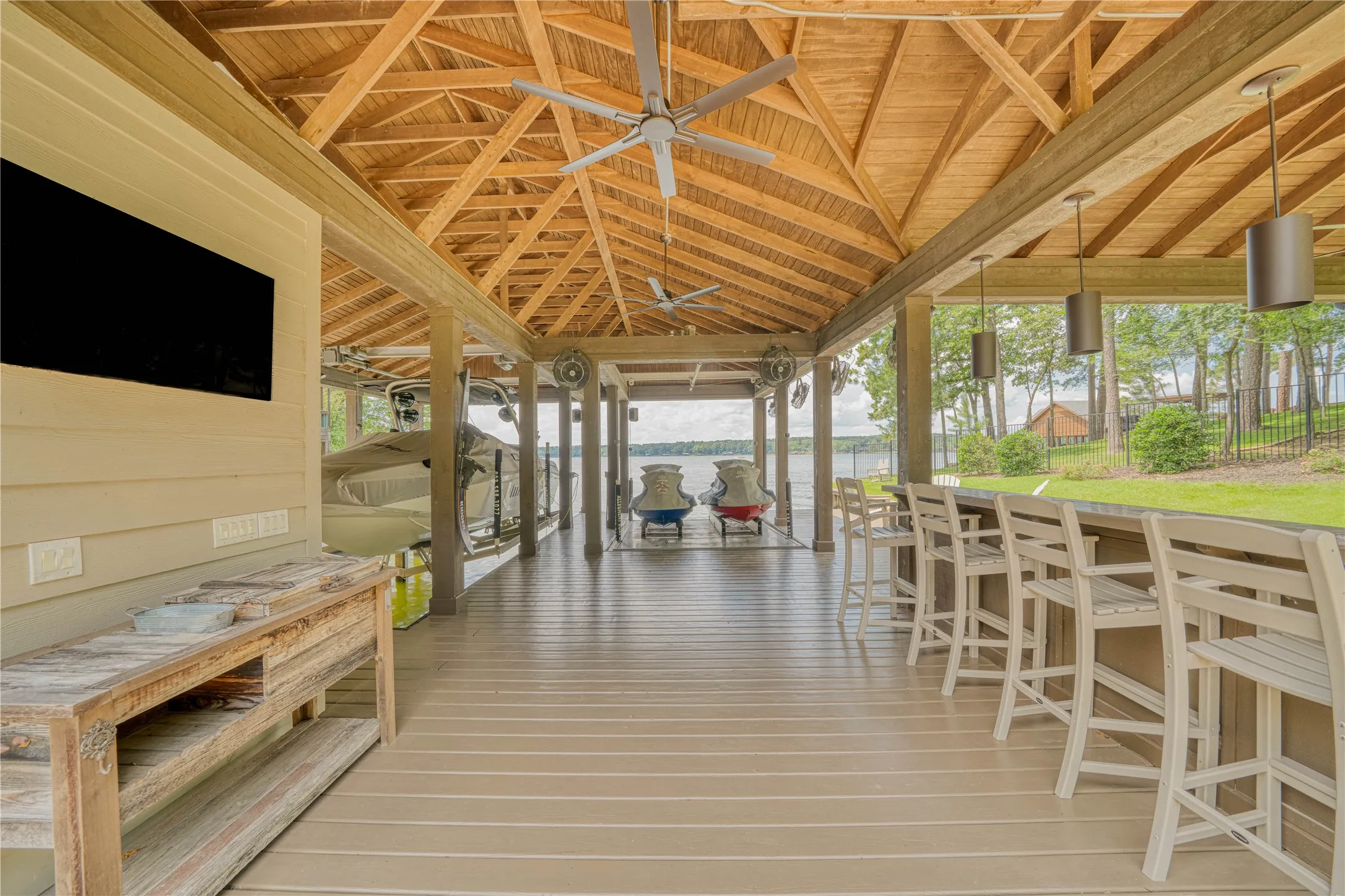 Boathouse-Covered Outdoor Living & Dining Areas