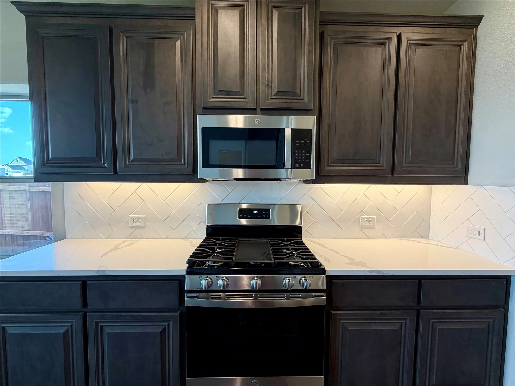 GAS GE range and microwave vents to the outside