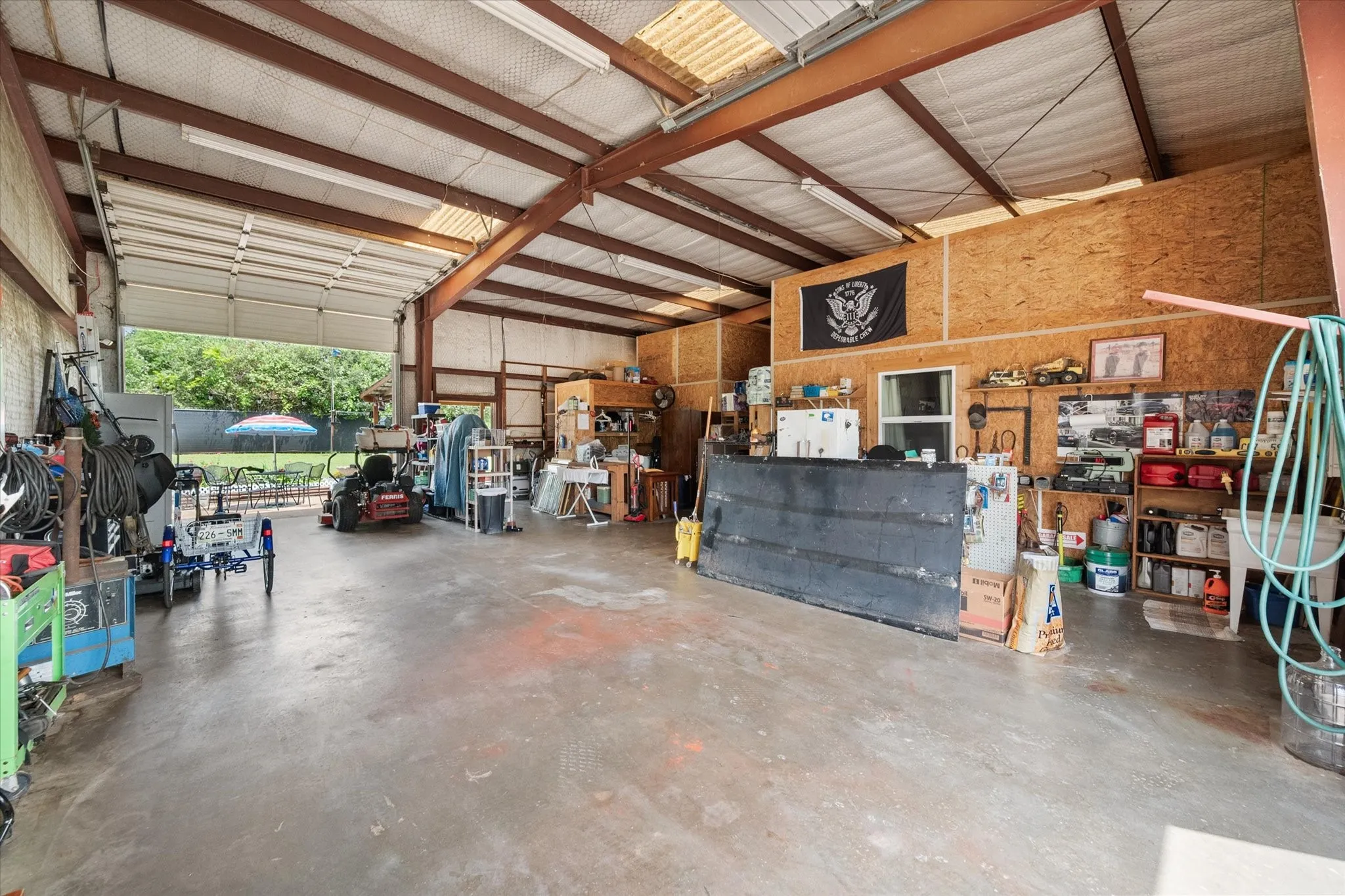 Shop Shop with 12'x12' chain-driven door facing backyard