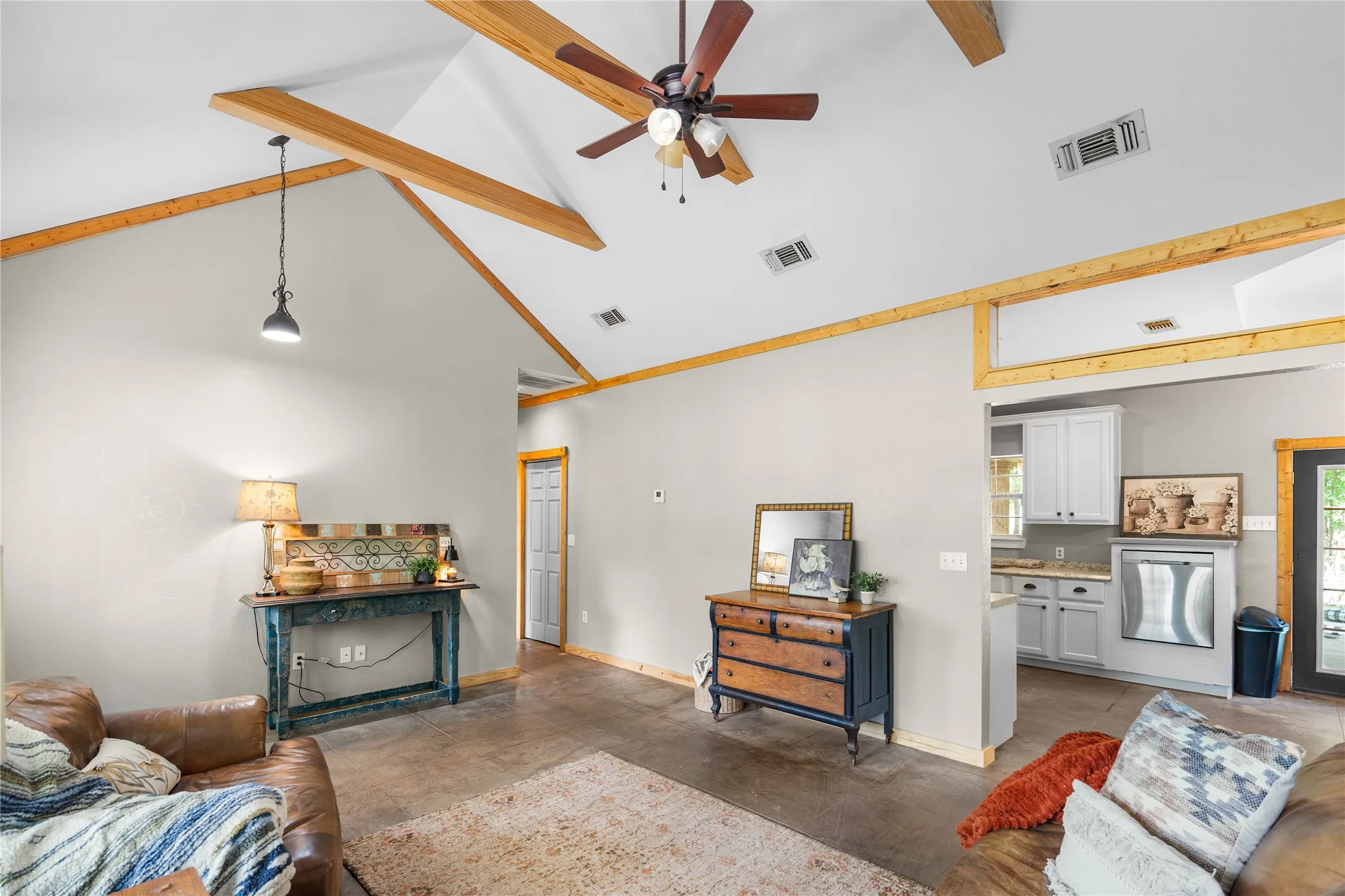 Vaulted ceiling with exposed wood beams