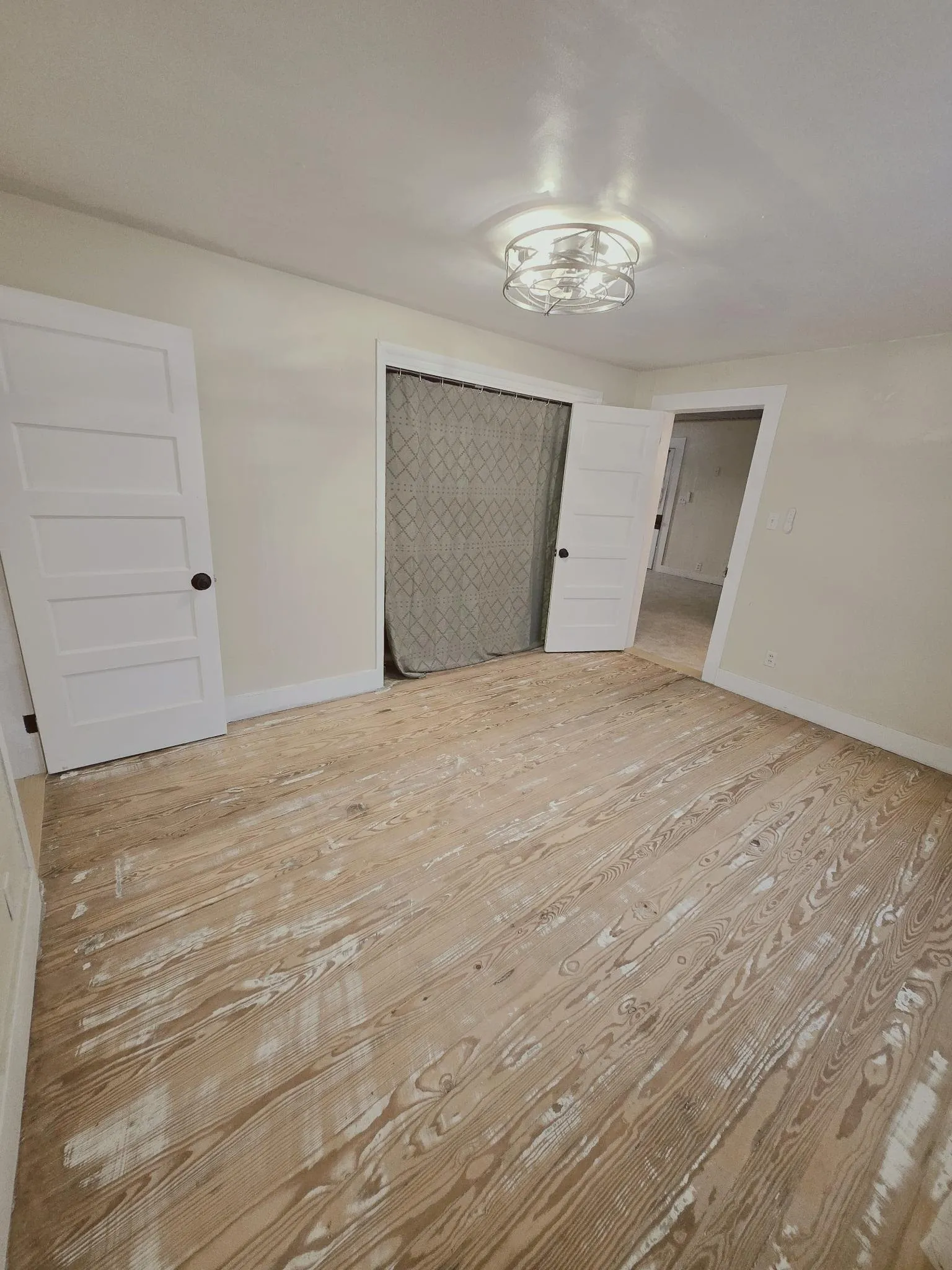 Natural wood floors provide a neutral canvas for your personal style in this quiet room.