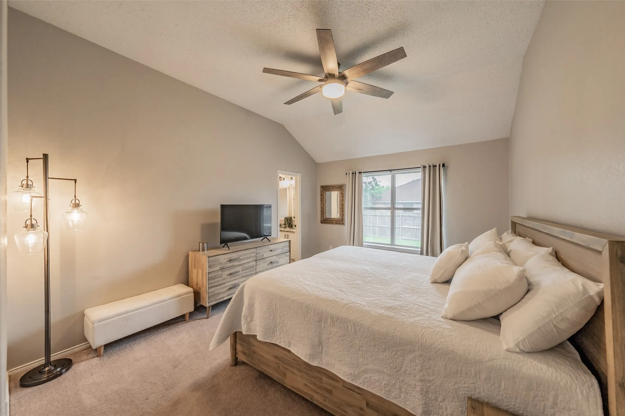  ceiling fan, neutral wall colors, carpeted flooring, and a double window with blinds