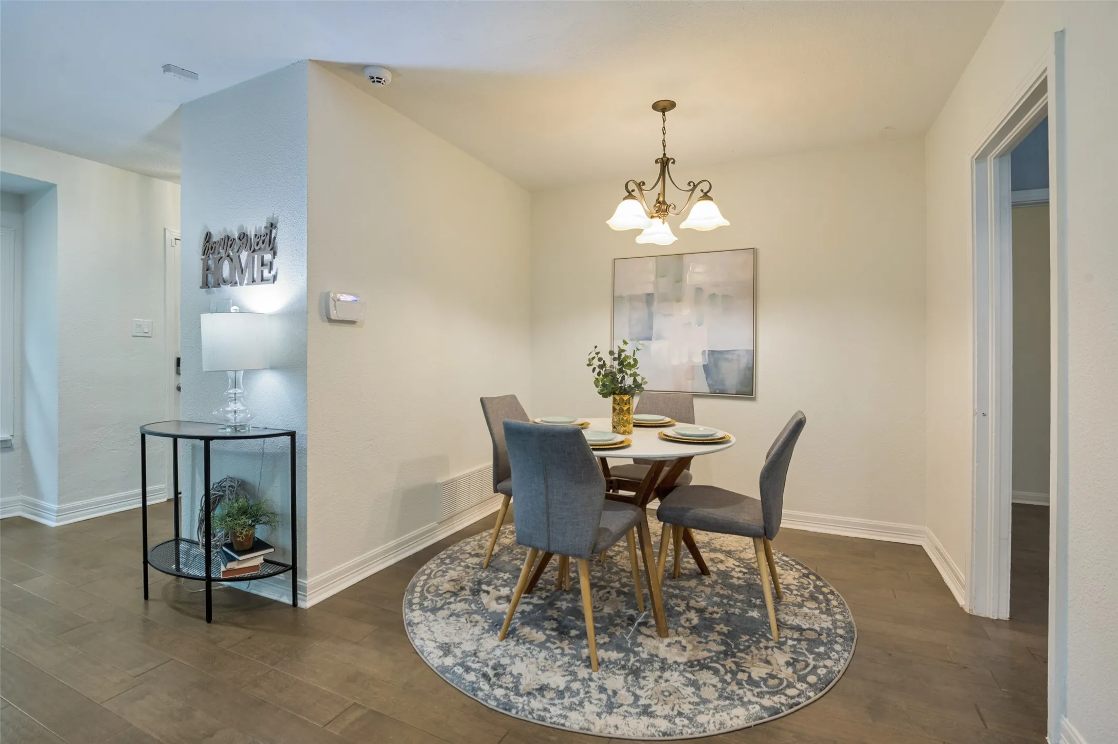DINING AREA OFF THE KITCHEN WITH ACCESS TO THE LIVING AREA