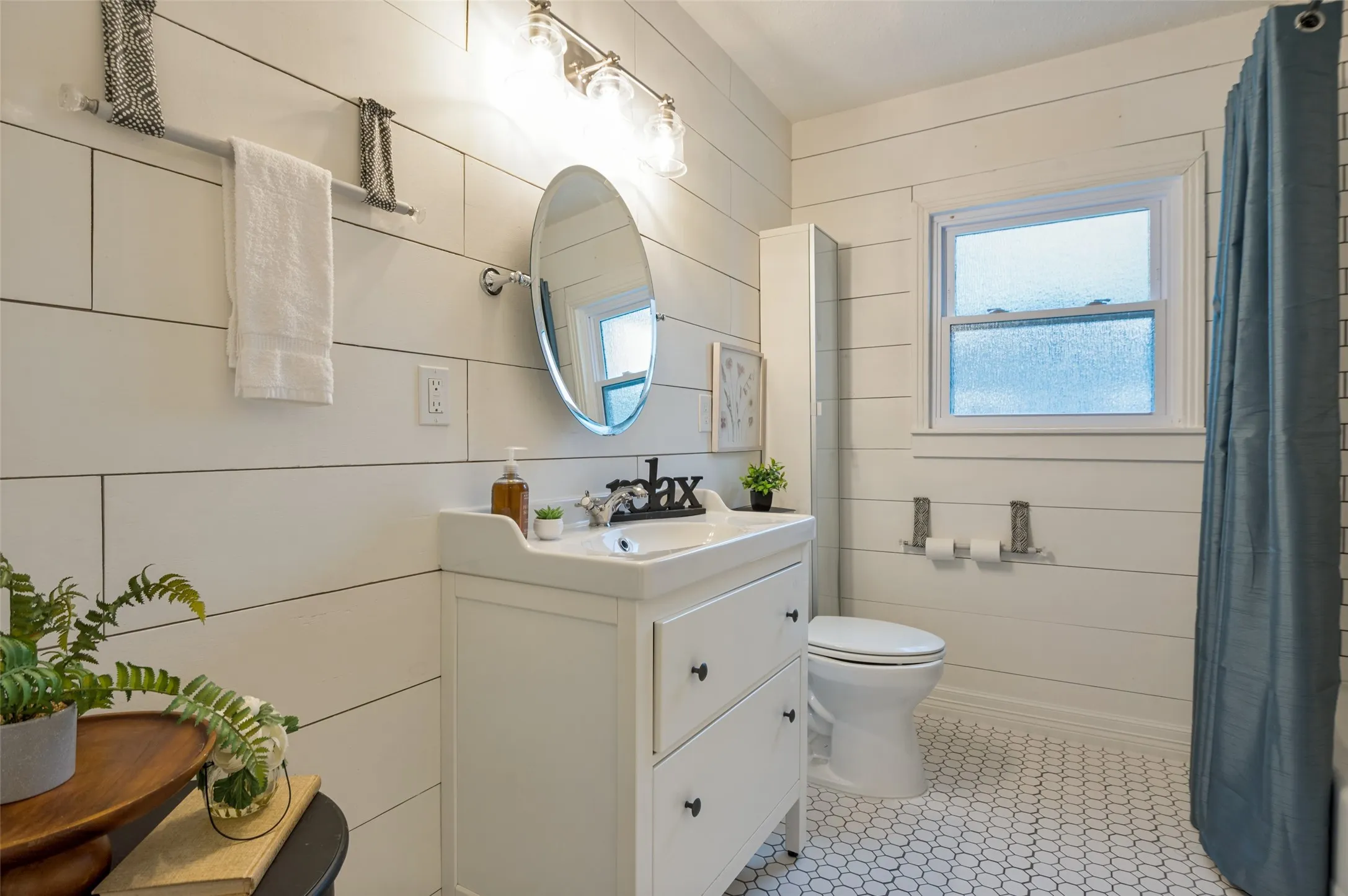 SHIPLAP AND TILE WORK MAKE THIS COTTAGE BATH A DREAM COME TRUE
