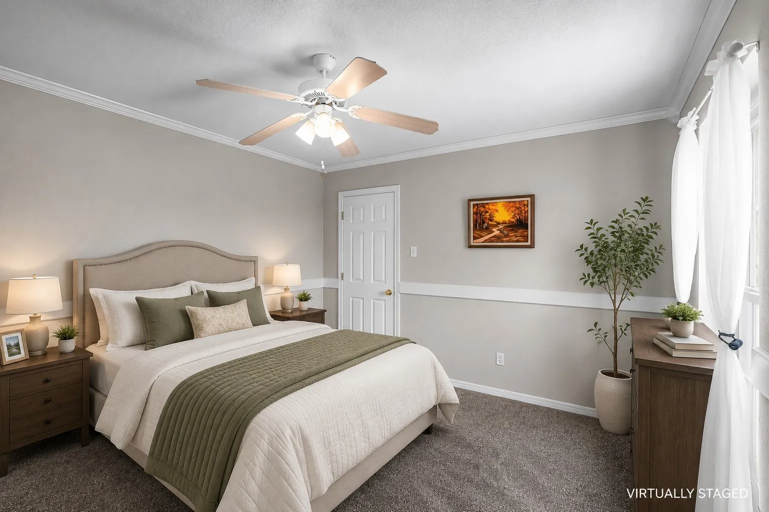 Carpeted room featuring crown molding, a ceiling fan with light fixture, a paneled door, and a window with curtains