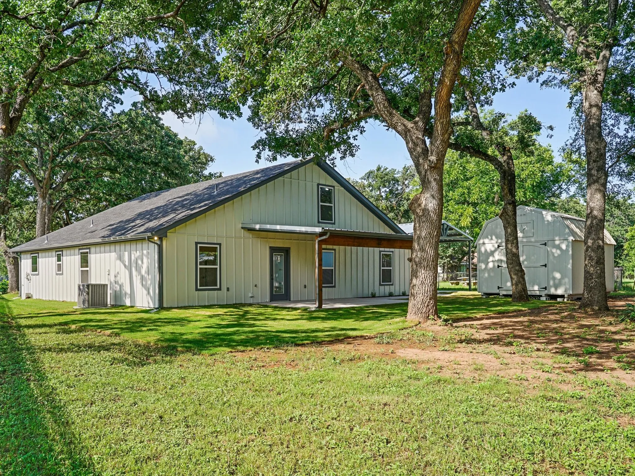 Back of home & backyard.