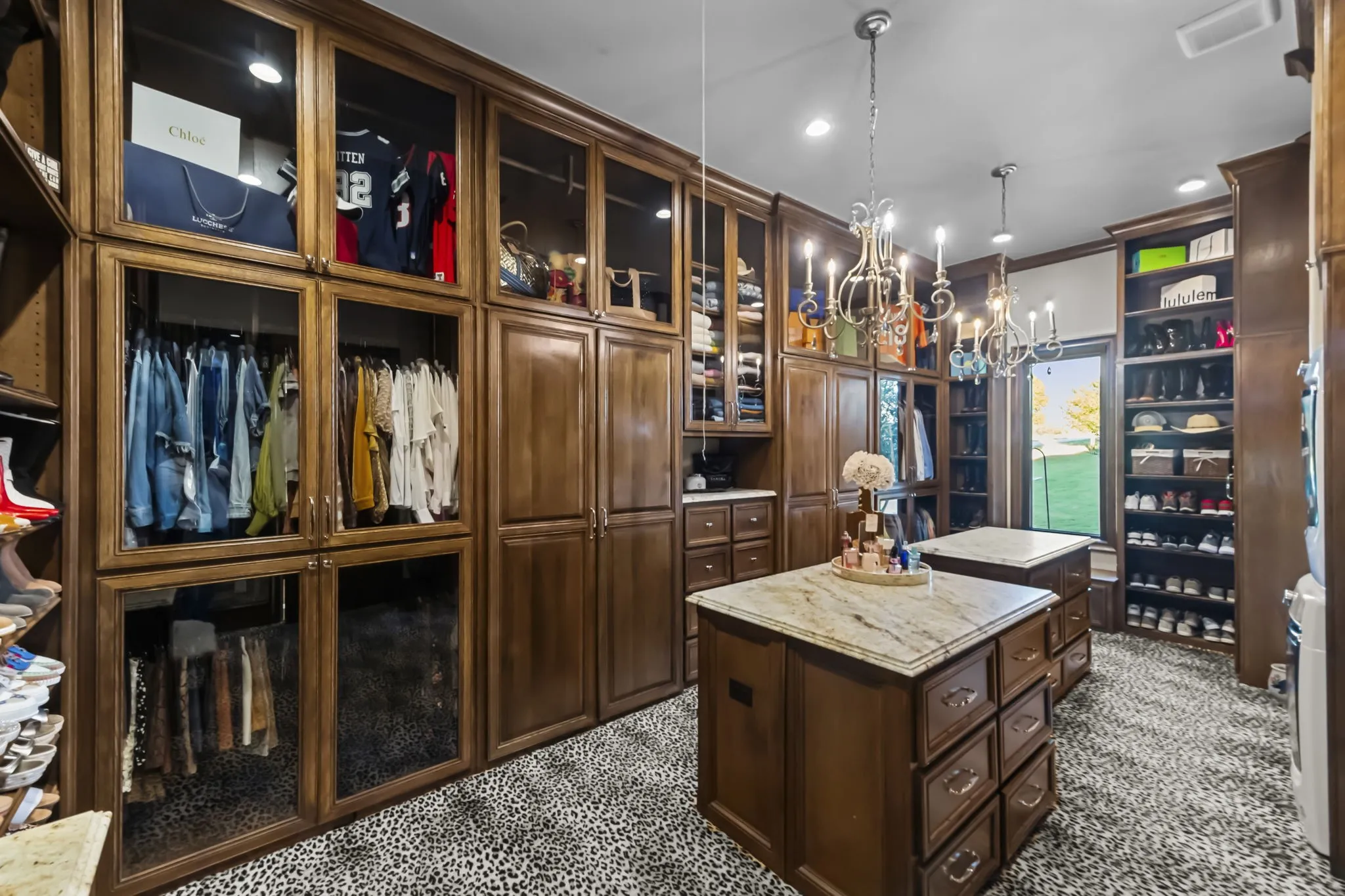 Fully custom built furniture and racks in primary closet