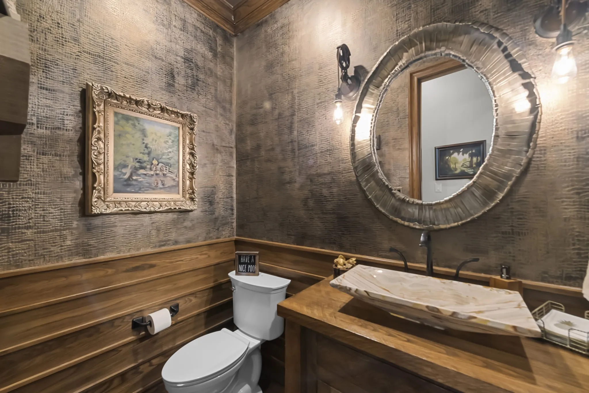 1/2 bath with hand painted textures and designs on the walls