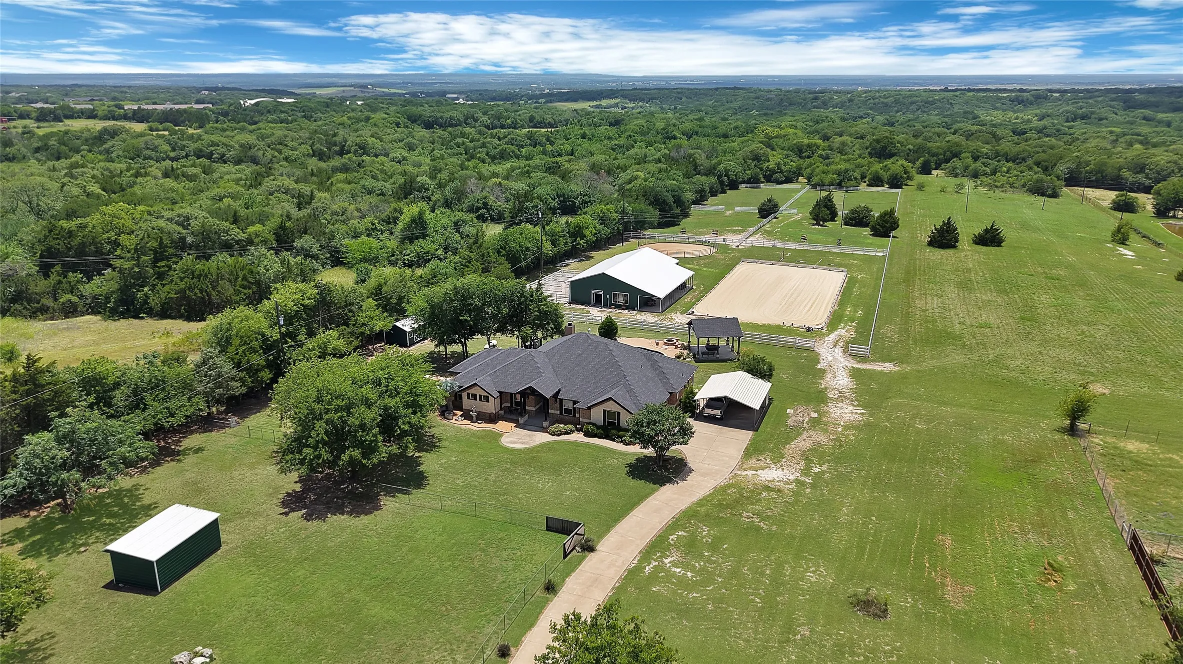 2+over sized side-entry attached garage & professionally added detached 2 car carport with storage