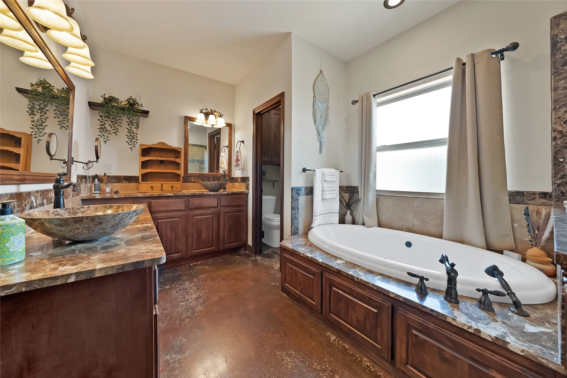 Spacious, dual vanities, private lavatory
