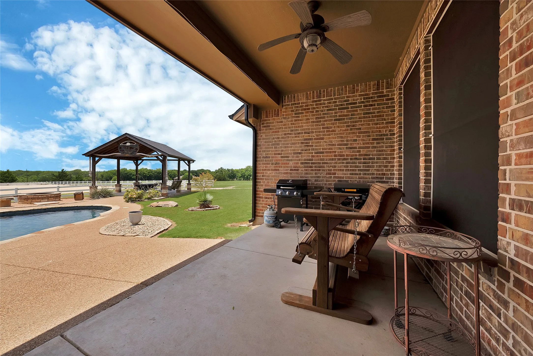 Amazing patio porch overlooking pool and equestrian facilities