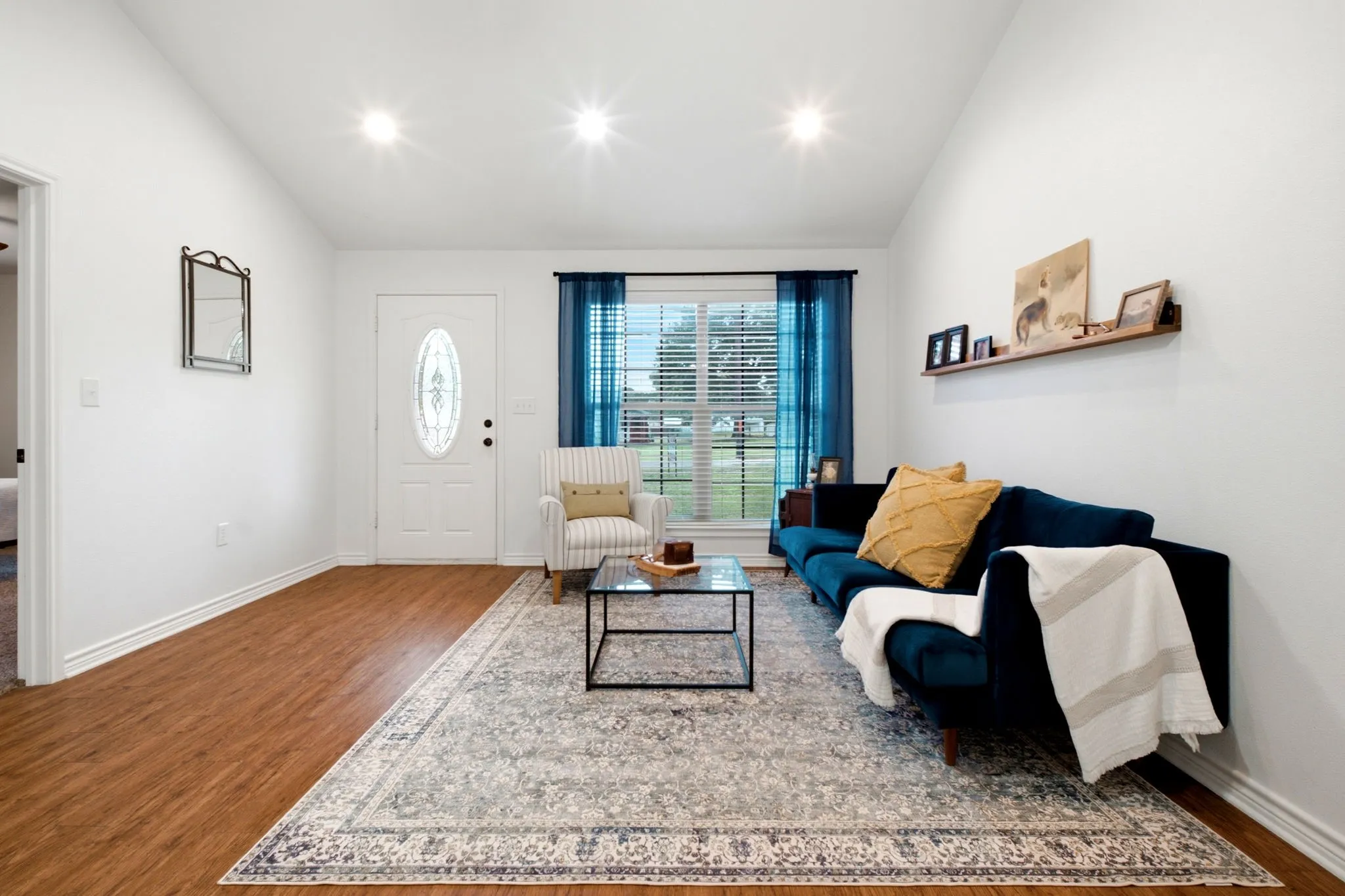 Bright and airy living room featuring neutral finishes ready for your personal style.