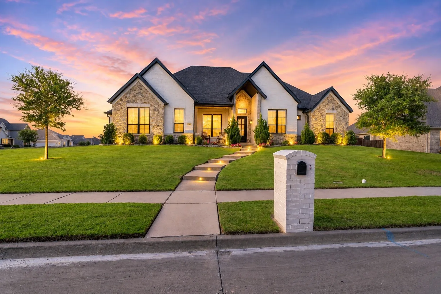 Contemporary single-story residence with stone and stucco exterior
