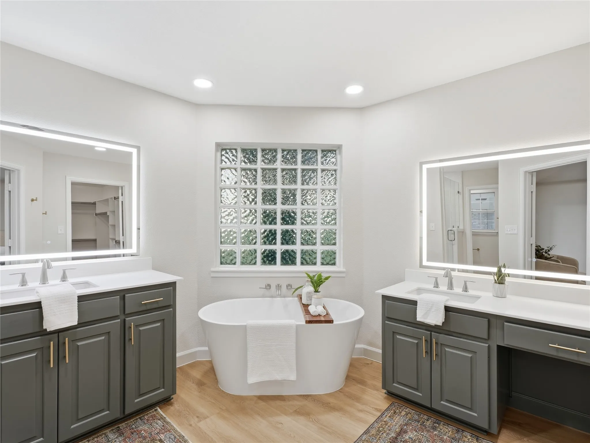separate vanity spaces-soaker tub