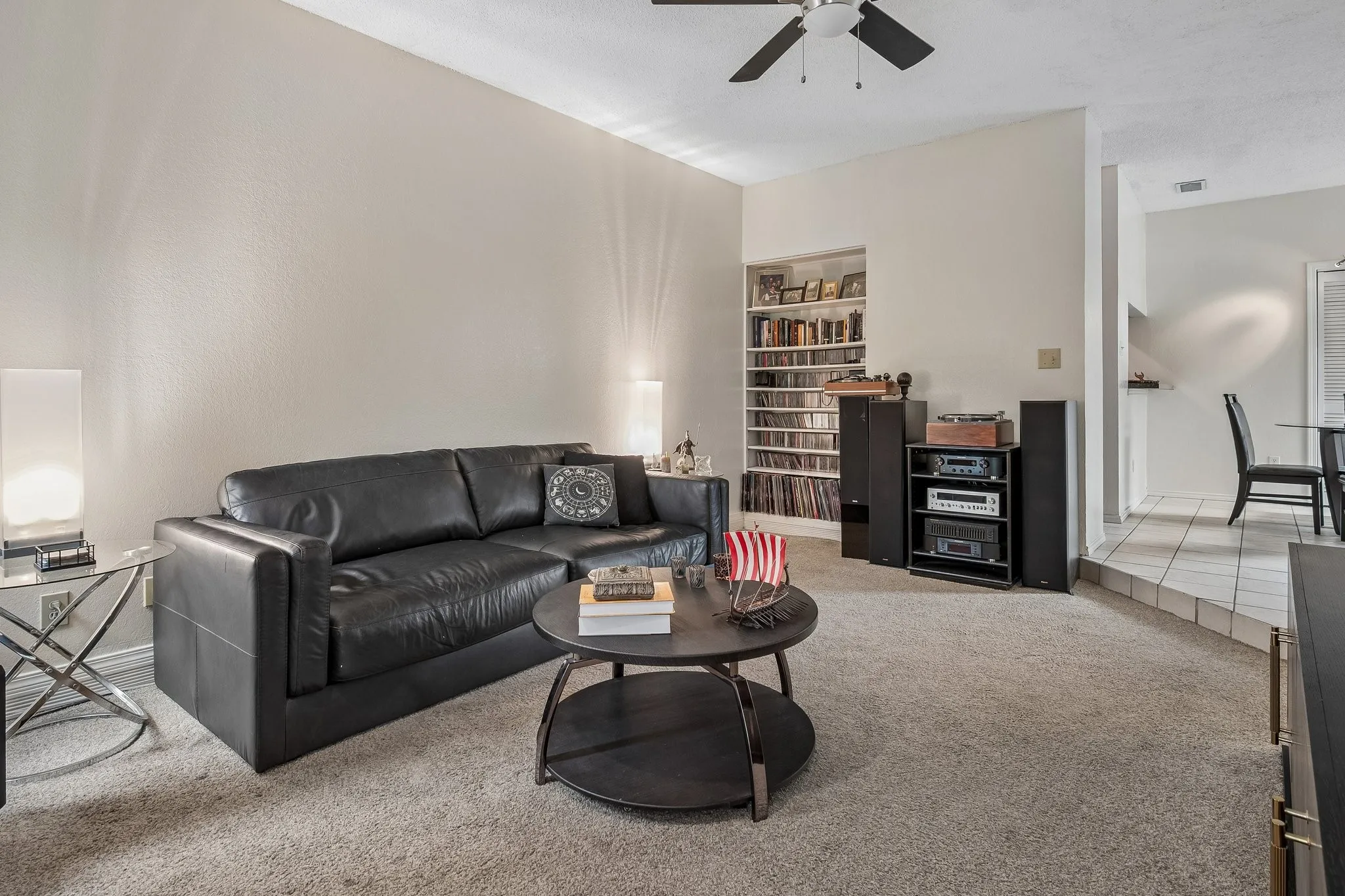 Living area with built-in shelving.