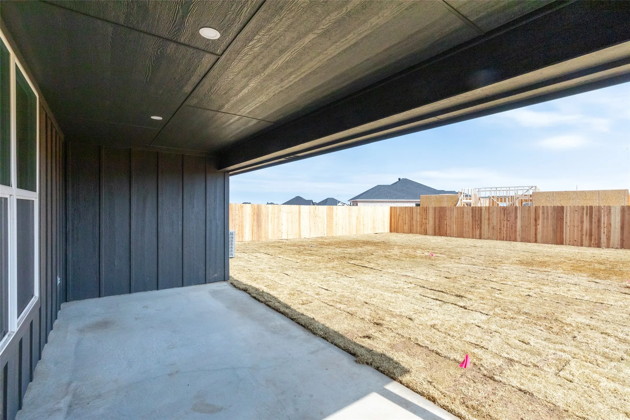 Covered patio featuring a concrete slab and recessed lighting