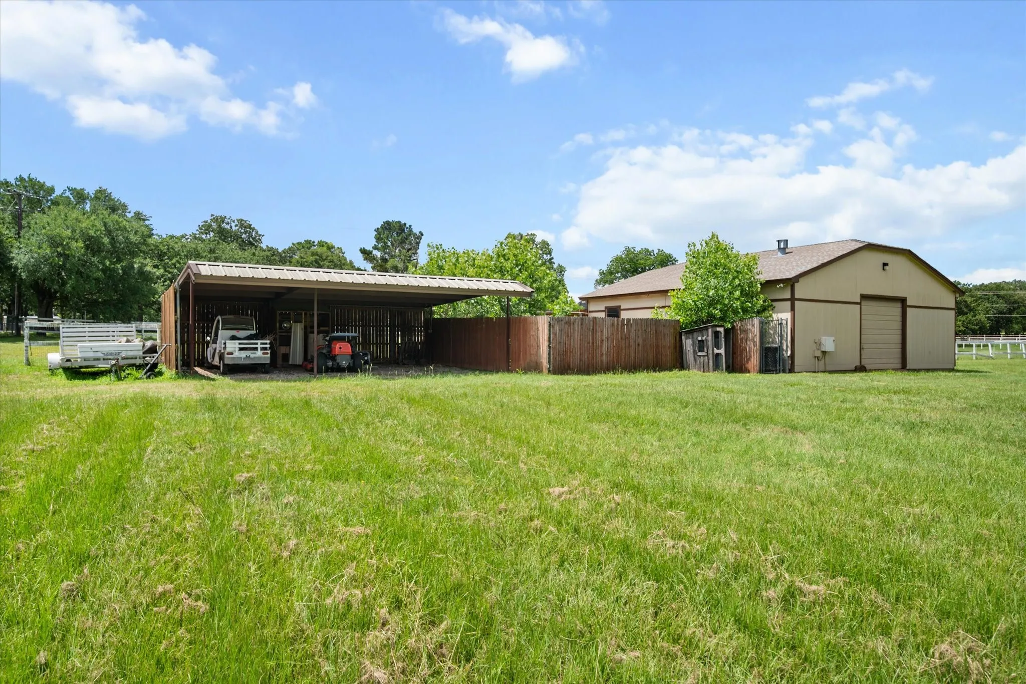 View of covered carport for extra parking or storage