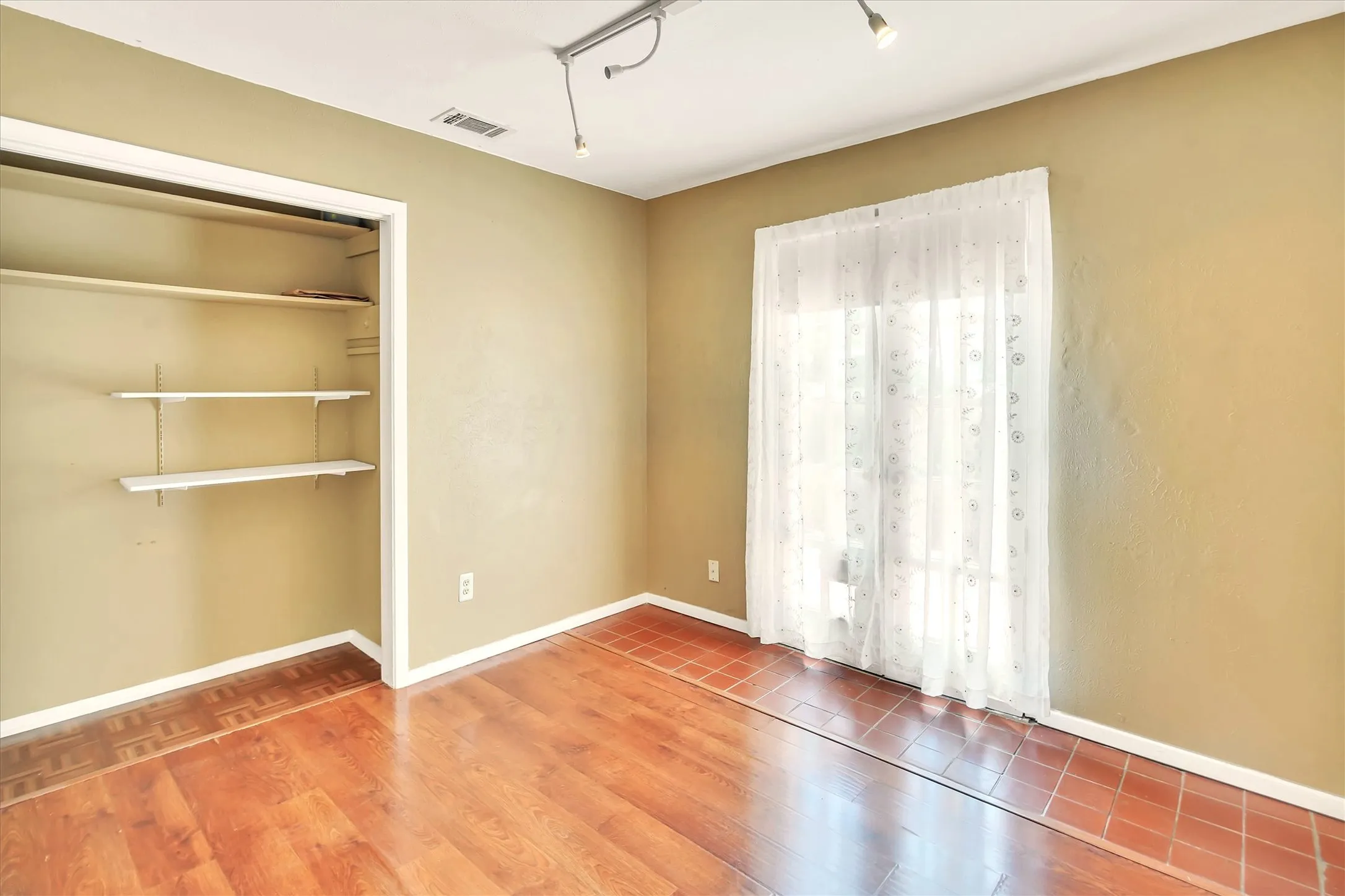 Office or bedroom with patio doors