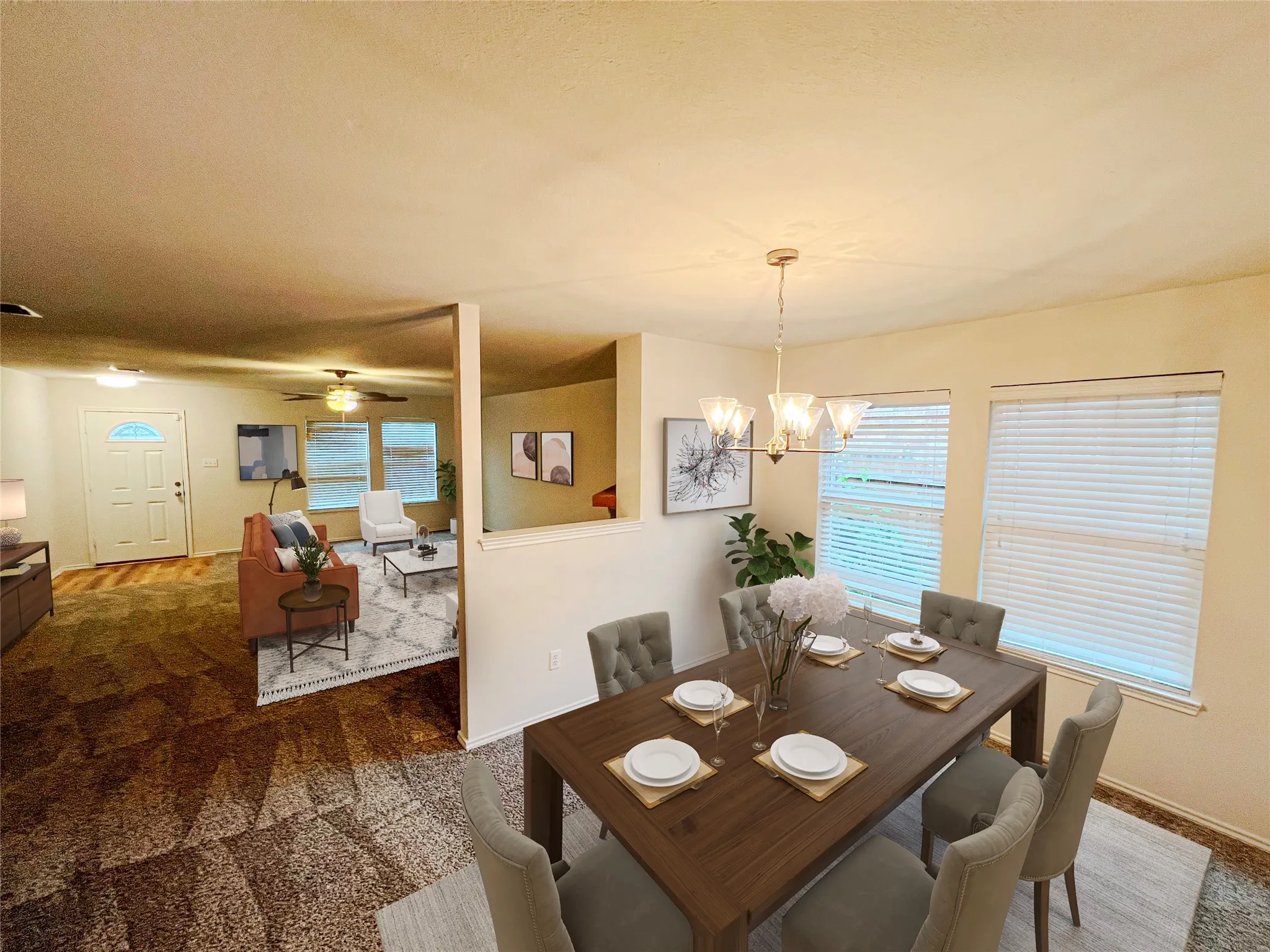 Dedicated dining area featuring a modern chandelier and multiple windows