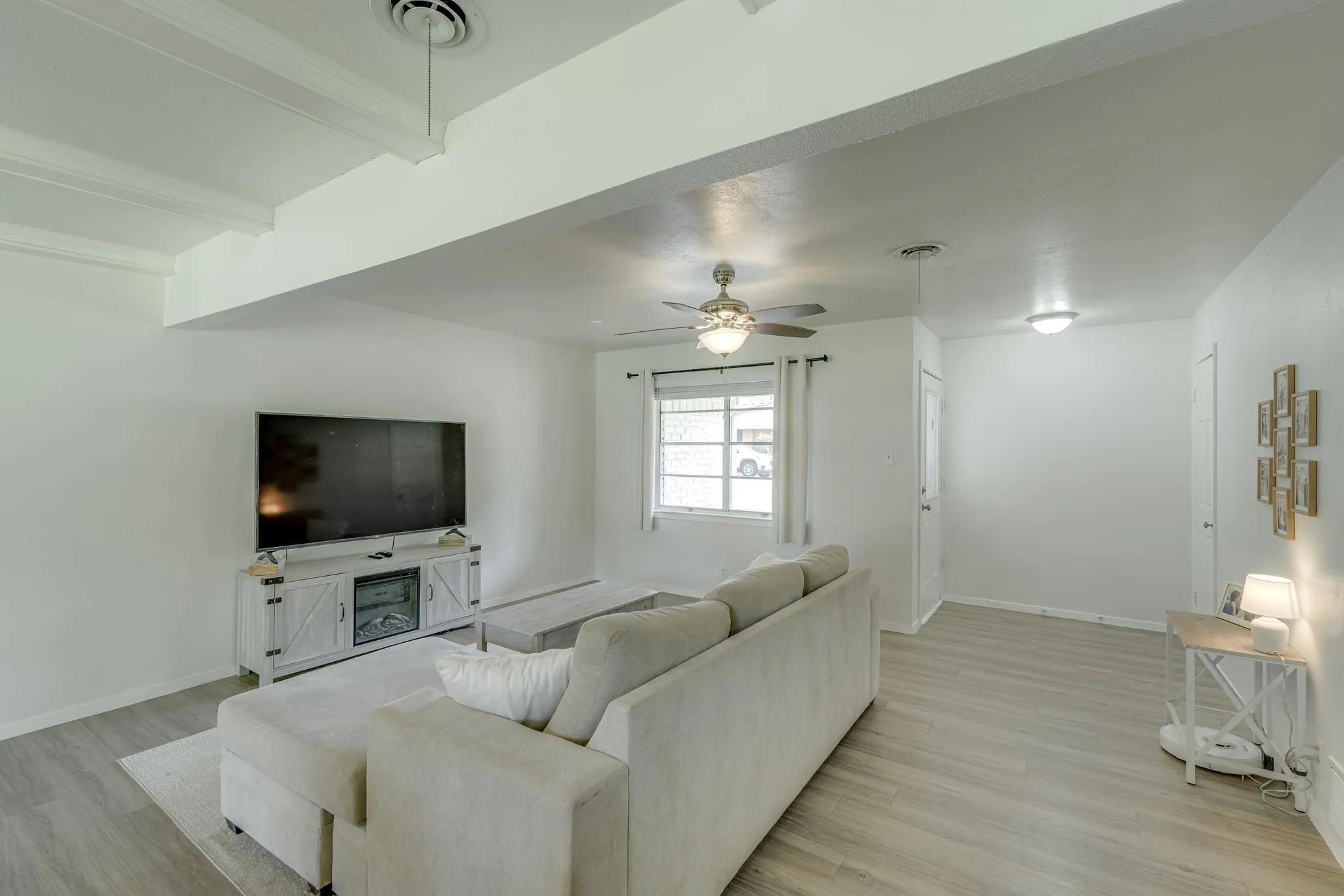 View of living room towards front door.