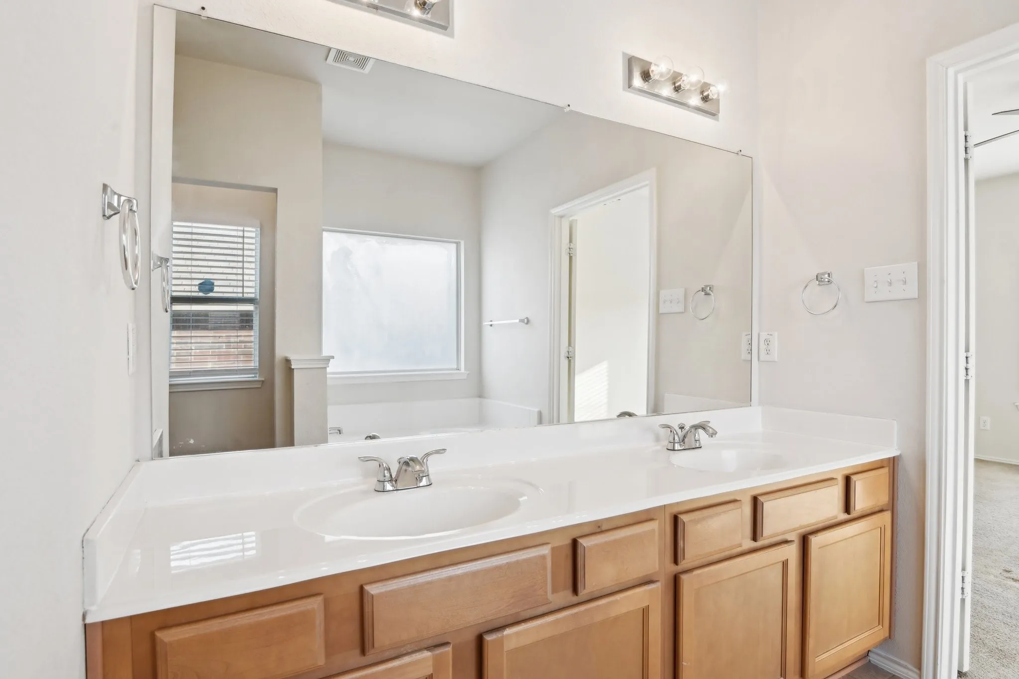 Bathroom with dual vanity sinks