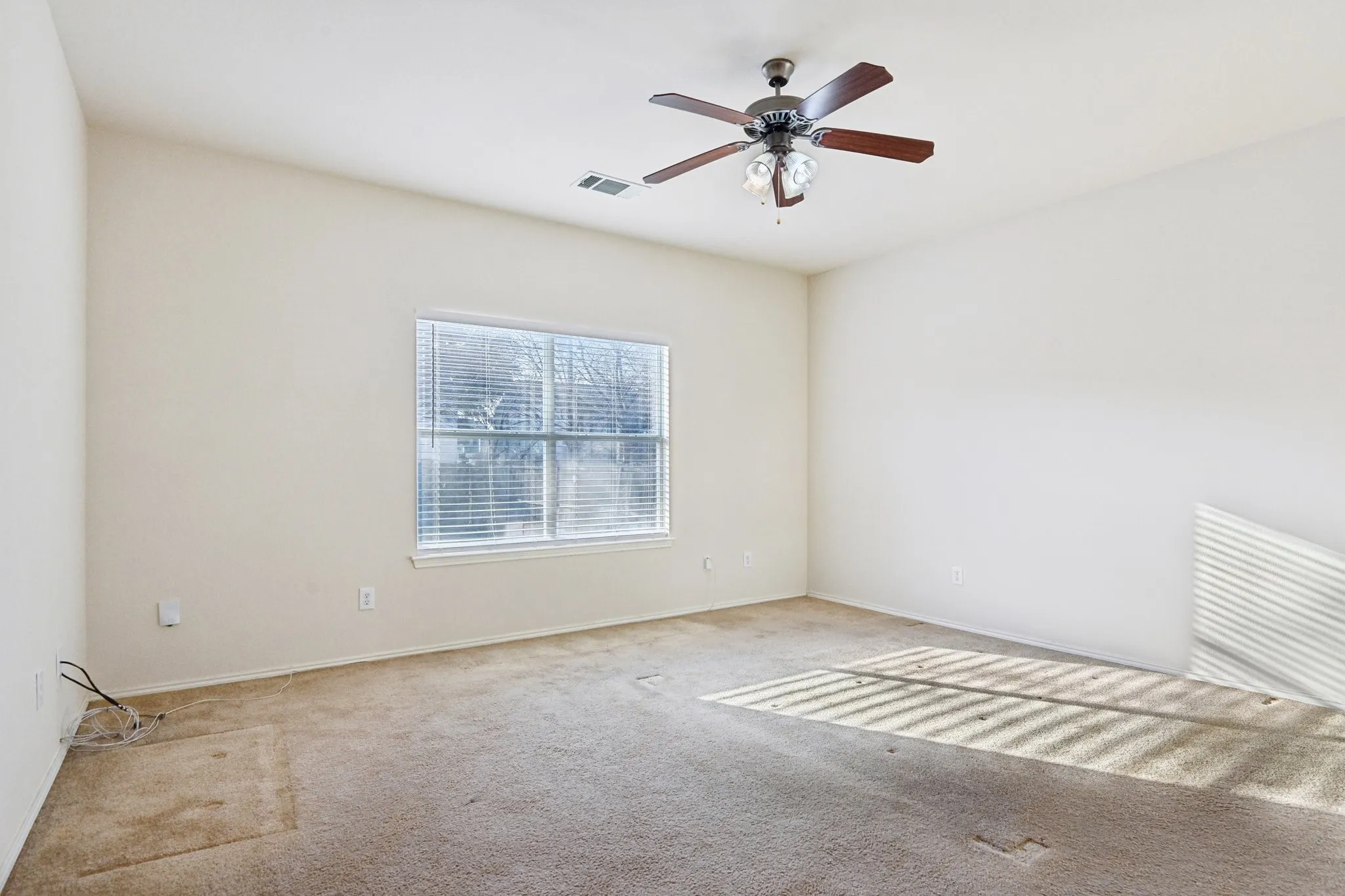 bedroom with carpet and ceiling fan