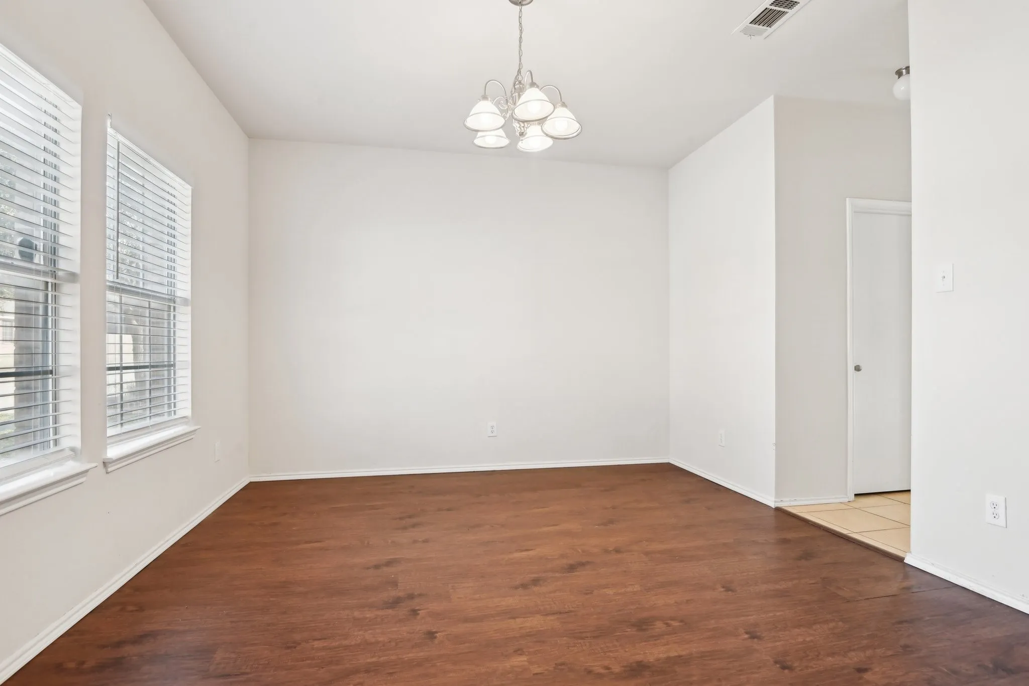 room with hardwood / wood-style floors