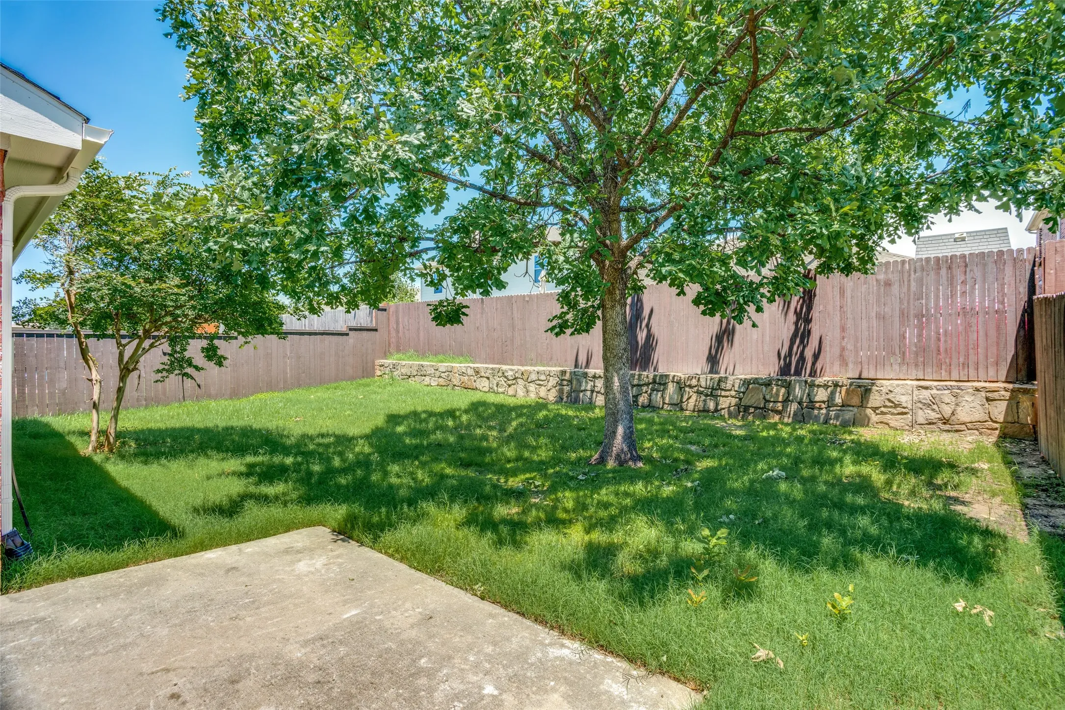 View of yard with a patio