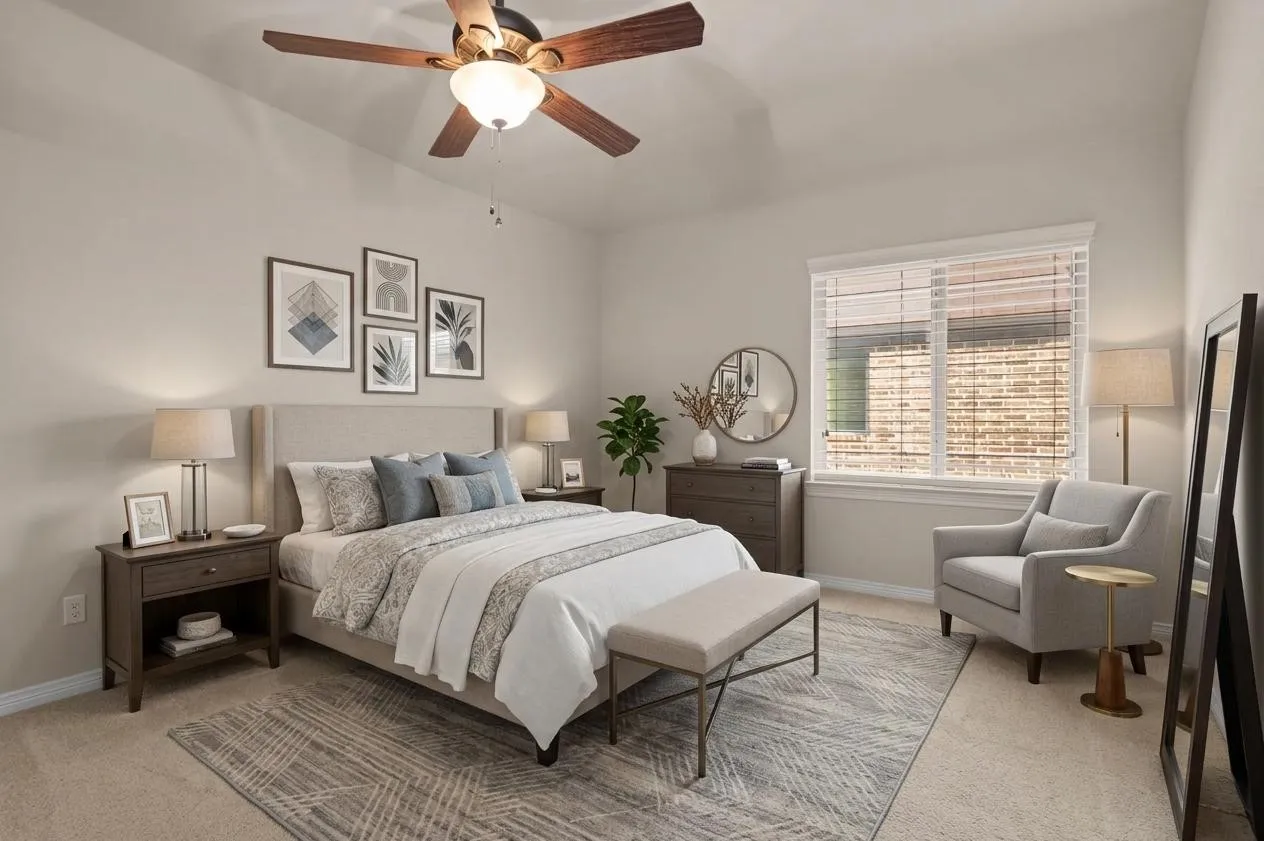 Virtually staged secondary bedroom with carpeted flooring and ceiling fan.