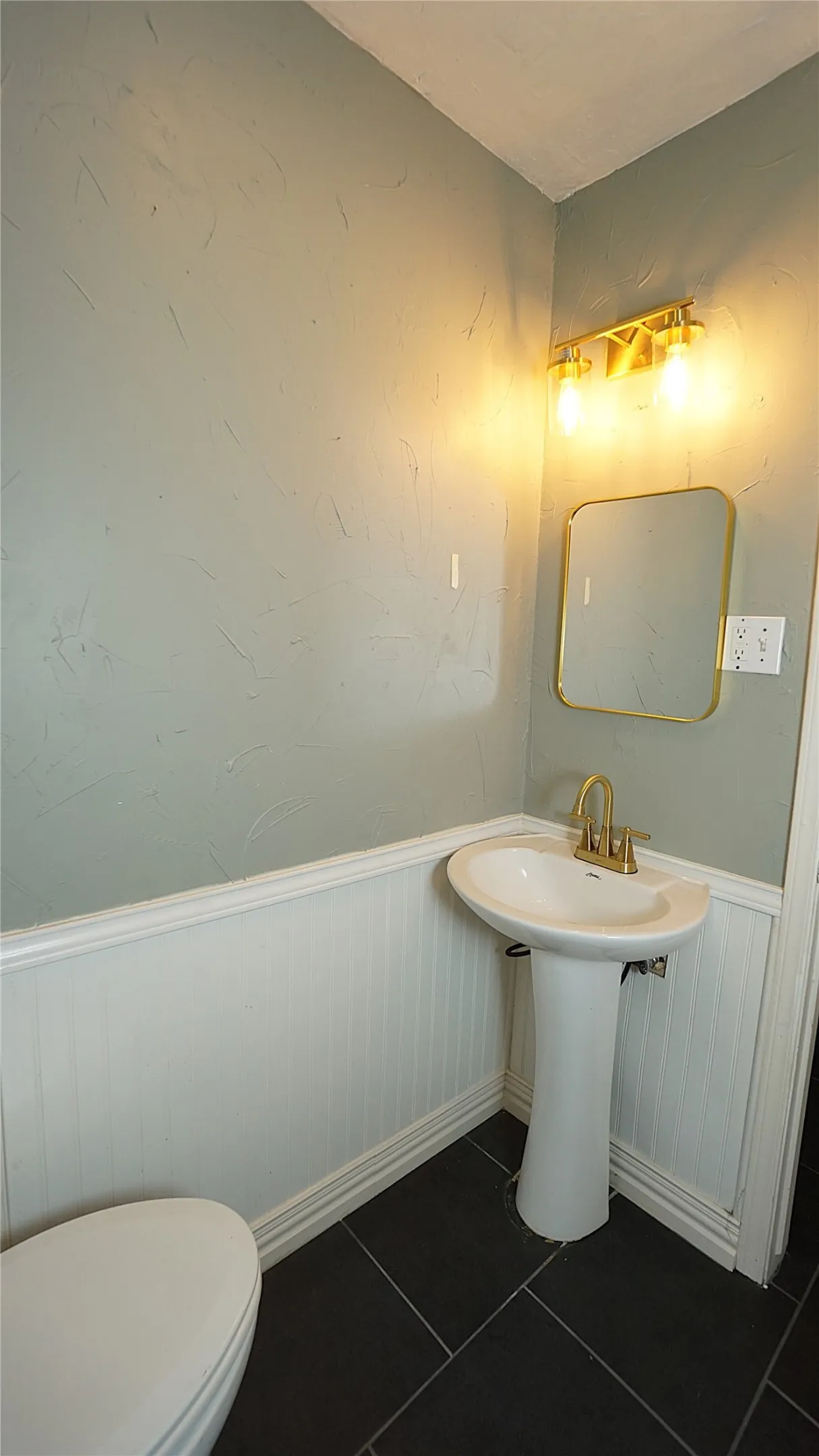 Off from garage area 1/2 bath