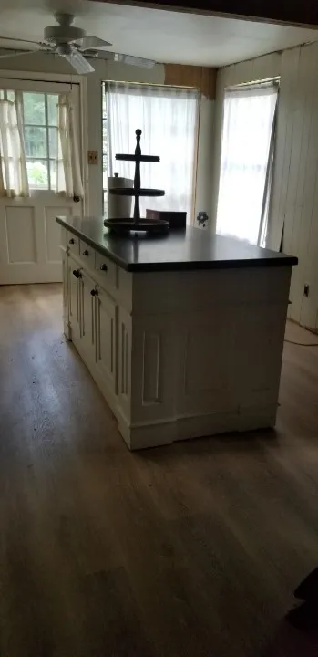 Kitchen with the updated removeable island in place of a dining room table.