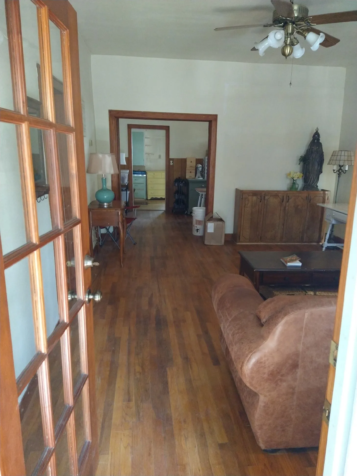 Entering the living room from the closed in patio/sun room.
