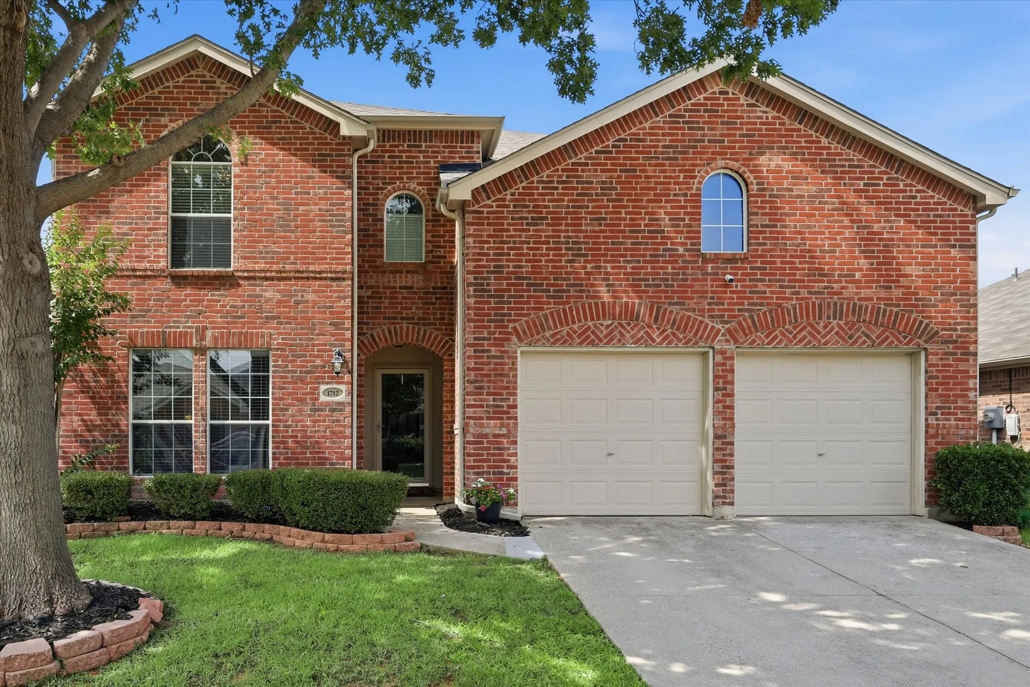 Red brick exterior with arched window details