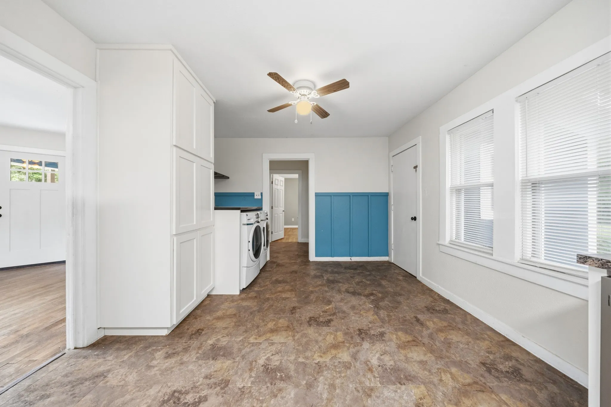 Eat in kitchen area with laundry