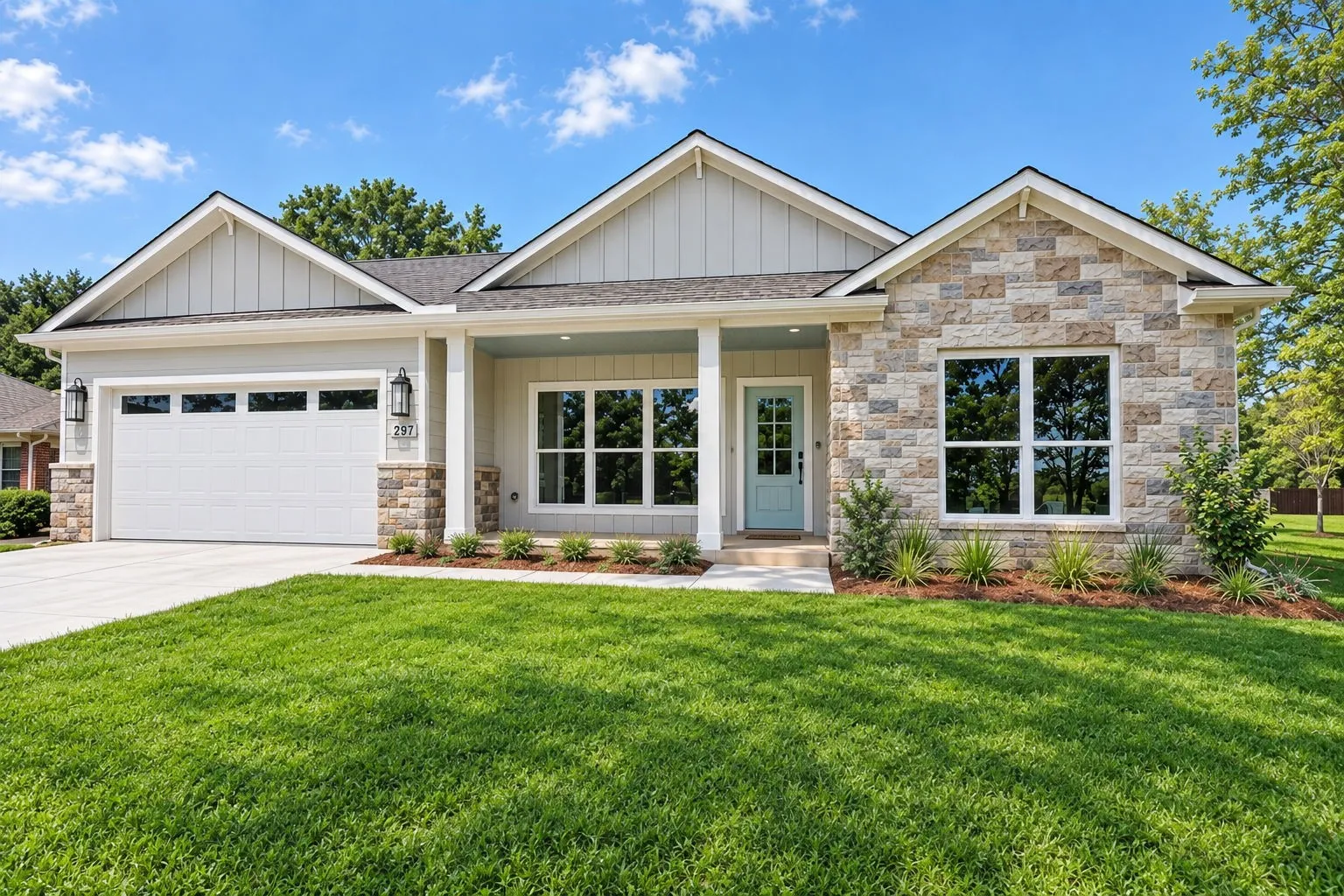 Stone and siding exterior with a light blue entry door